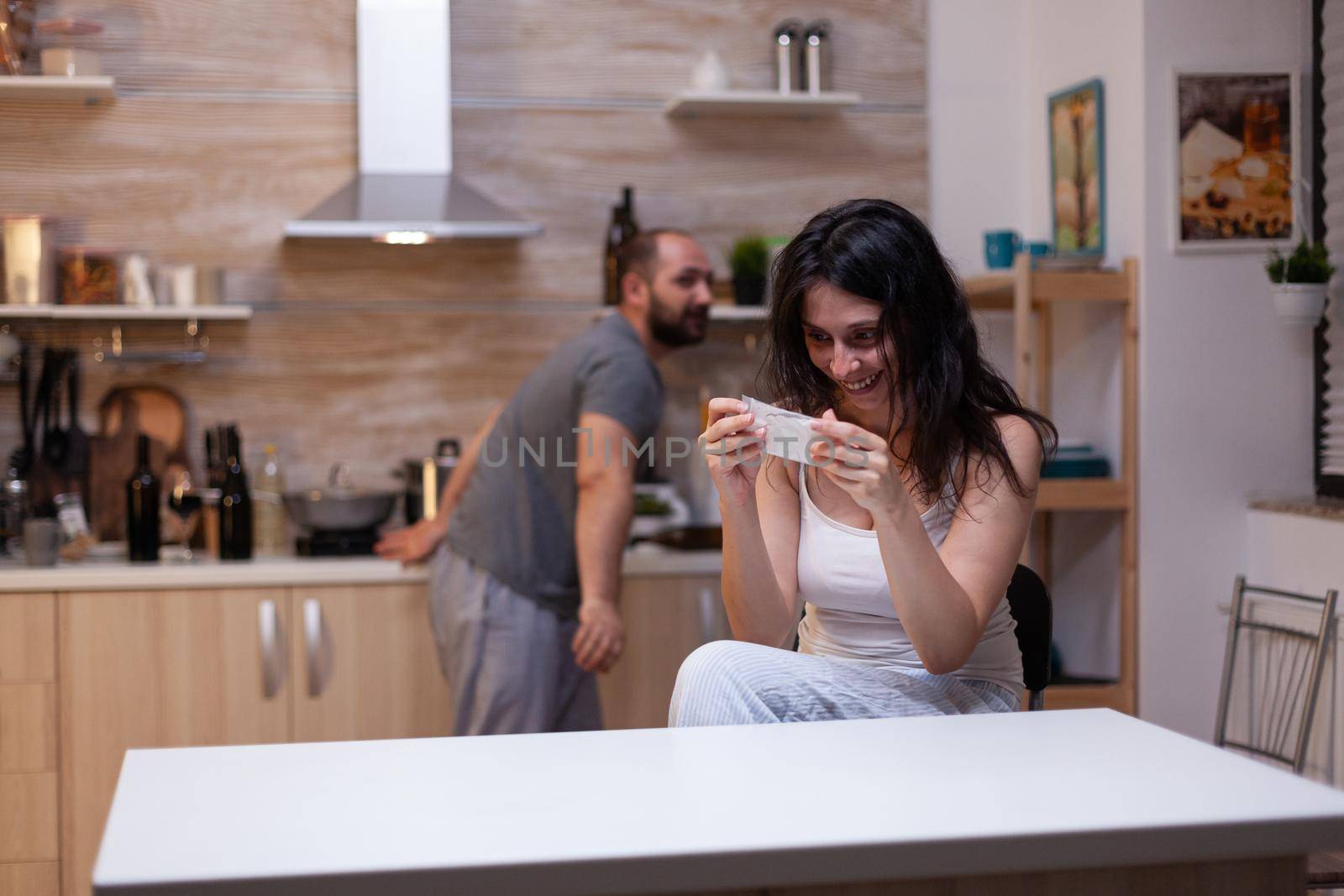 Caucasian couple with narcotic drugs addiction getting bag of white powder. Woman holding cocaine, heroin, illegal substance in hand waiting to inhale for dependence and craving