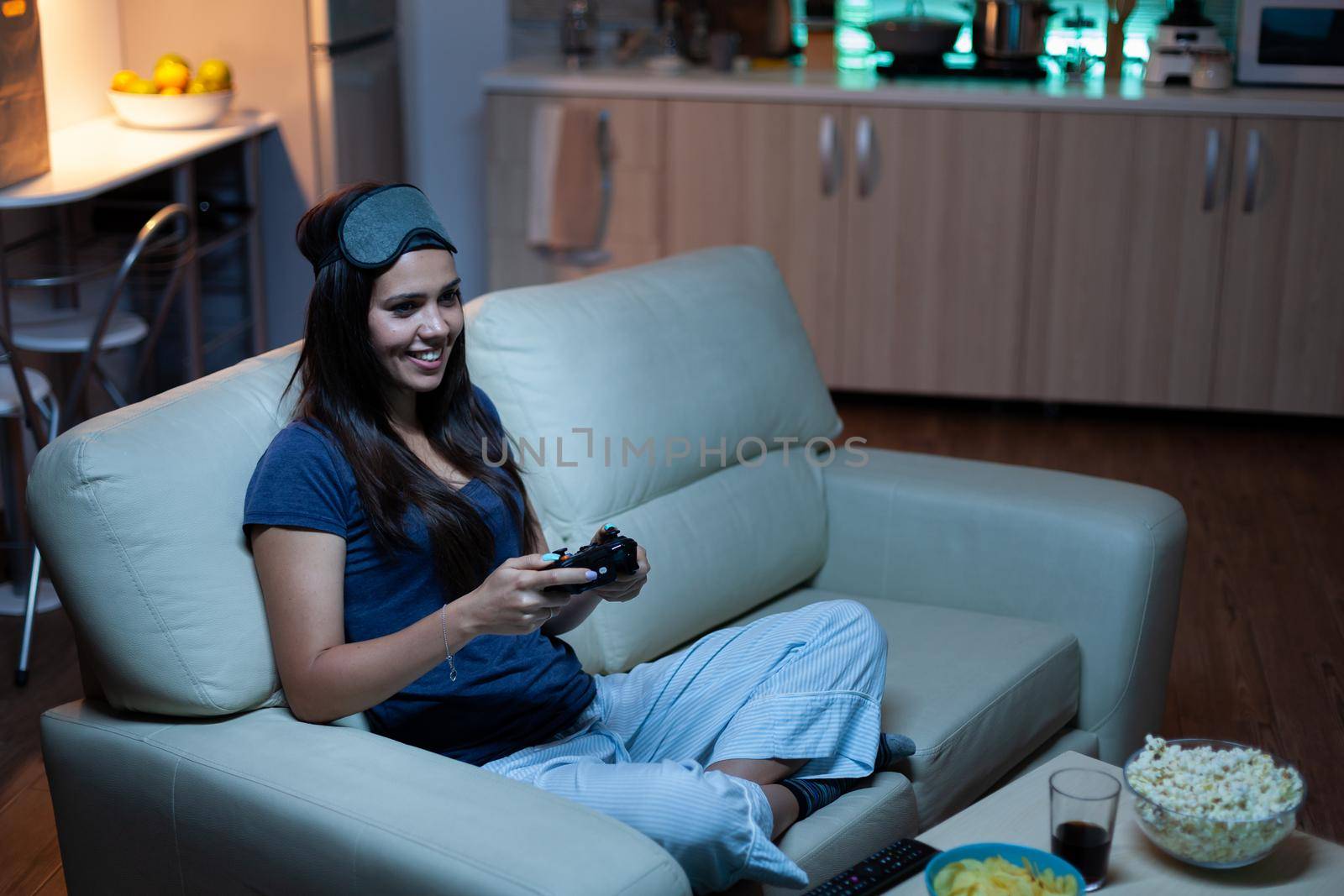 Gamer using joystick playing video games by DCStudio