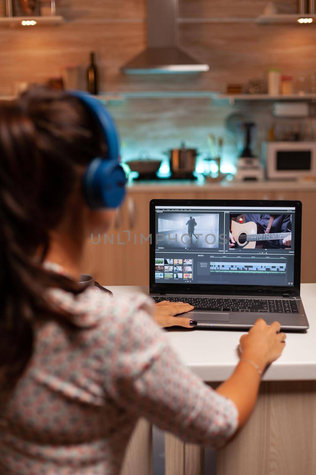 Movie maker editing a film using modern software by DCStudio