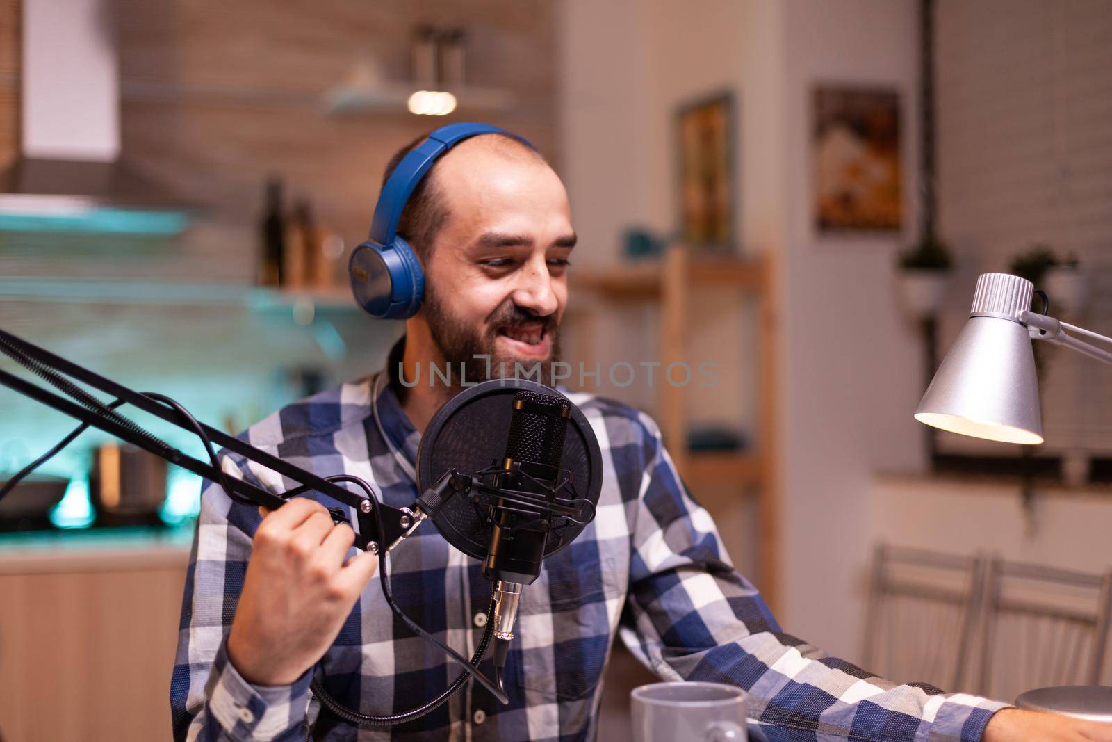 Vlogger recording podcast using production station in home studio. Creative online show On-air production internet broadcast host streaming live content, recording digital social media communication