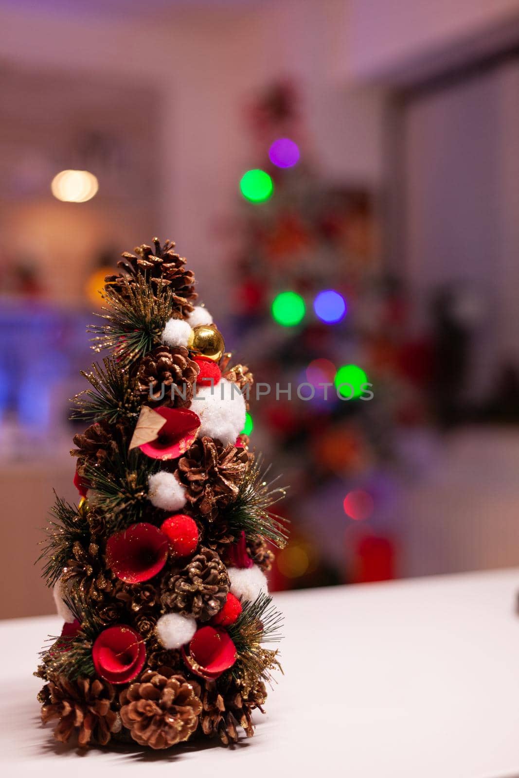 Close up of christmas tree in festive kitchen organized for winter by DCStudio