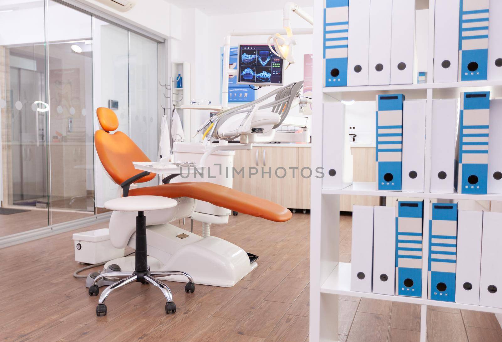Empty stomatology orthodontic office room with nobody in it by DCStudio