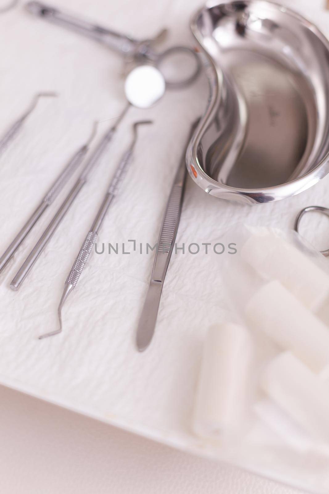 Close up of oral dental instruments ready for dentistry teeth surgery in stomatology hospital room. Modern office equipped with professional medical tooth tools ready for dental healthcare