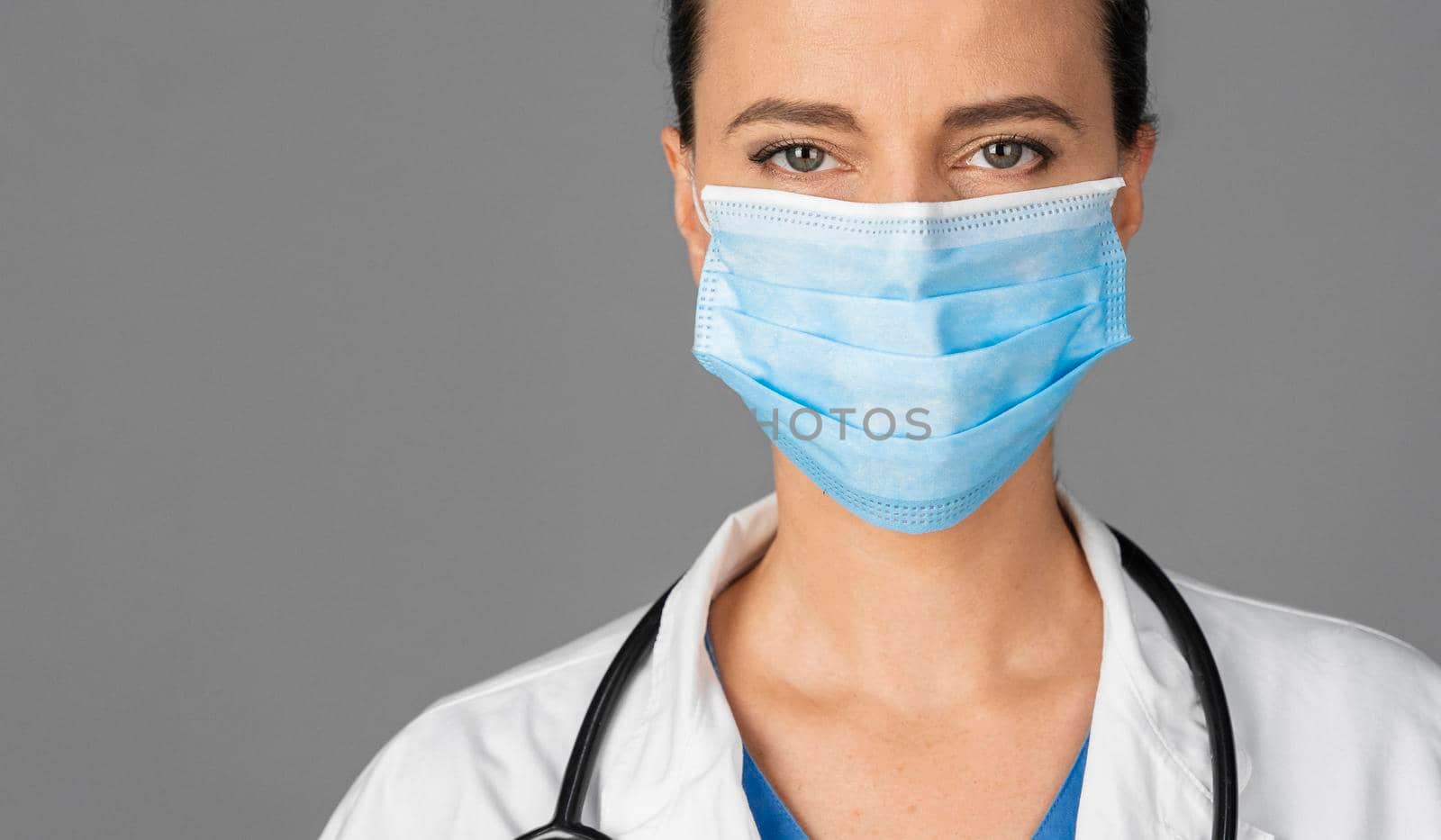 female doctor hospital wearing mask. High resolution photo