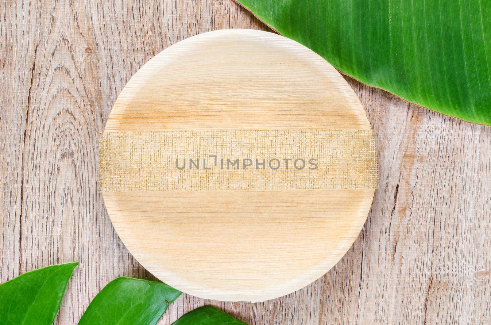 Kitchenware made from dried betel nut leaf palm, natural material. The Green product eco friendly concept.