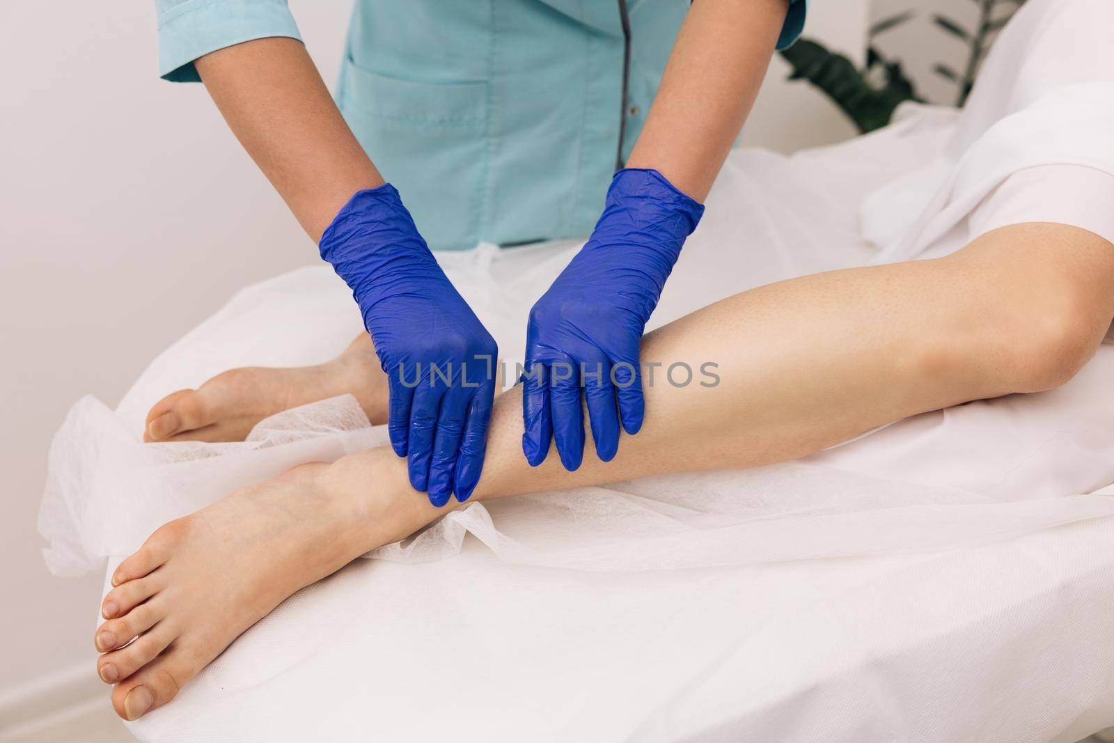 Physiotherapist worker woman assisting physical medical exercise recovery after injuries. Rehabilitation. Treatment Healthcare Concept by uflypro