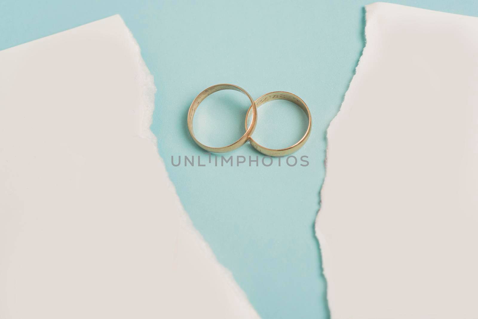 broken paper wedding rings. High resolution photo