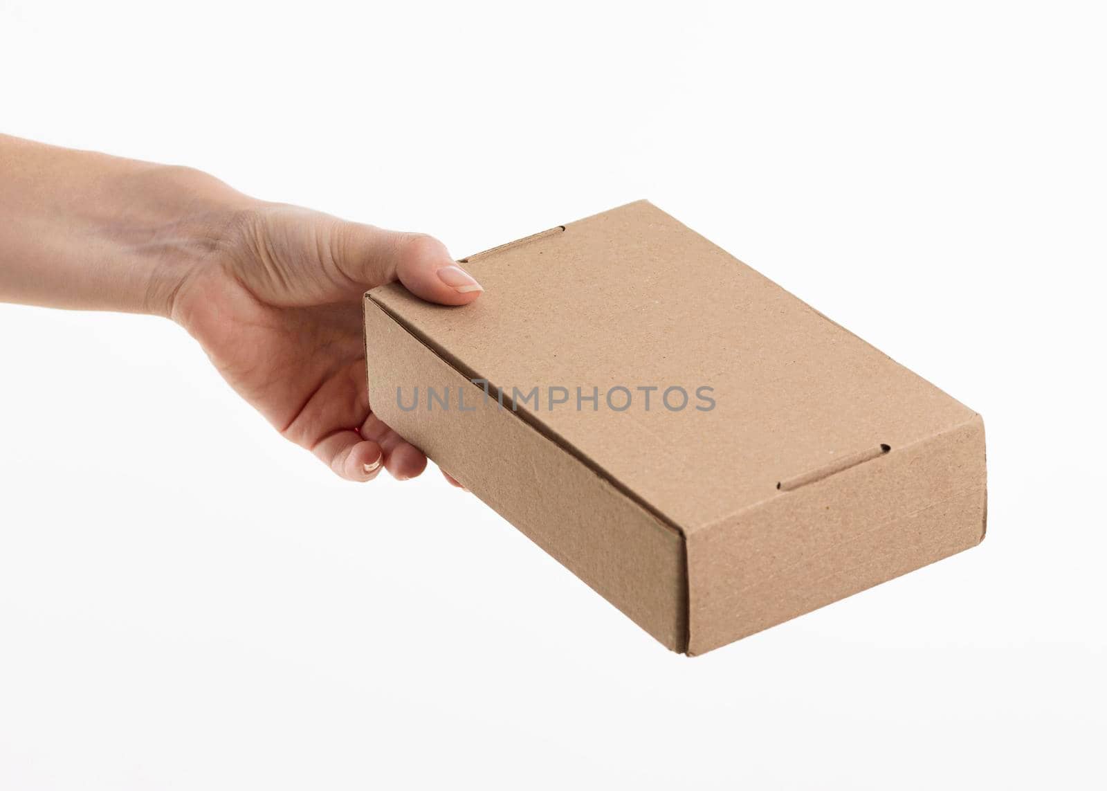 hand giving cardboard box. High resolution photo