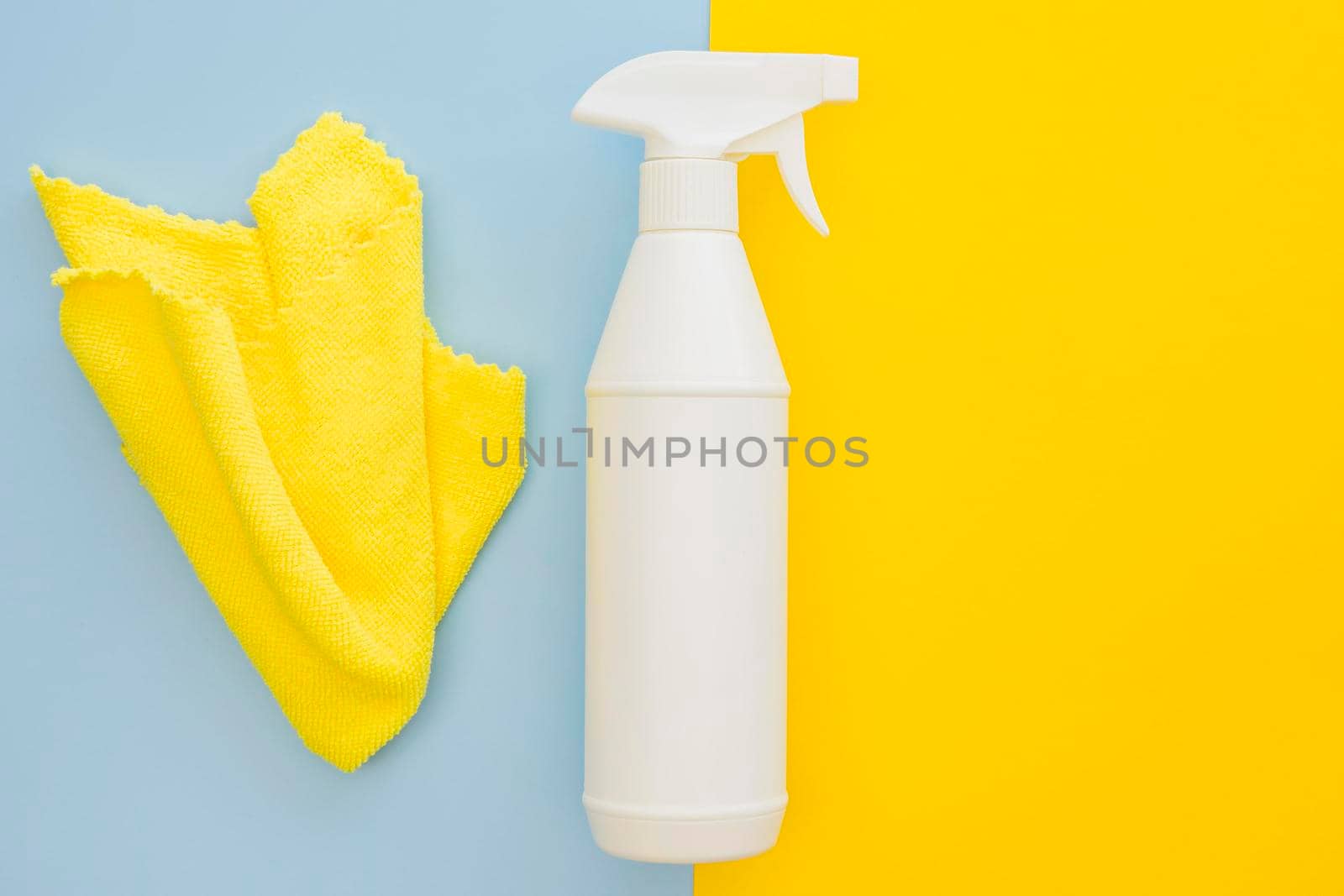 top view spray bottle cloth table. High resolution photo