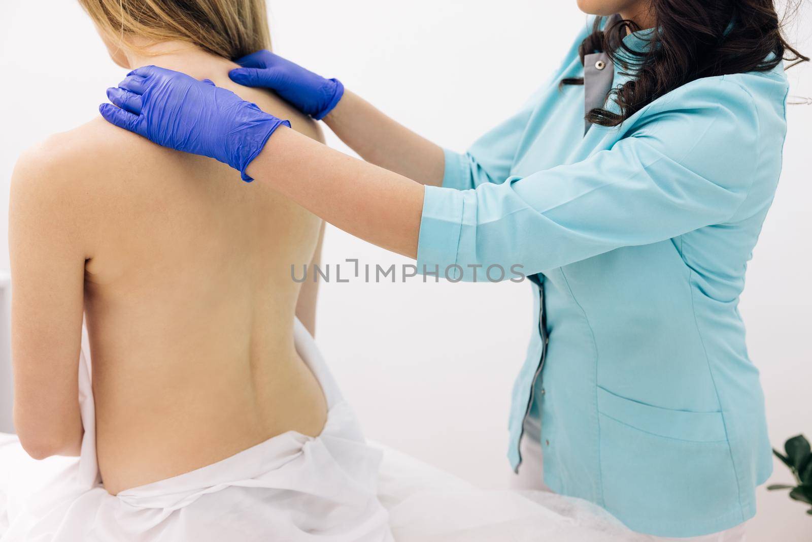 Physiotherapist worker doing treatment. Modern rehabilitation physiotherapy worker with woman client. Physiotherapy improves the patient's quality of life