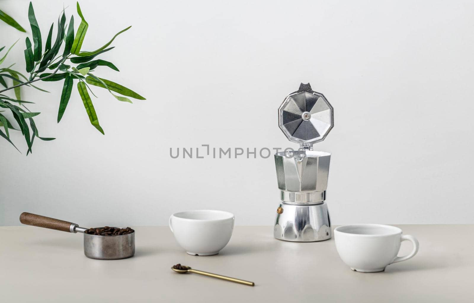 front view table with coffee cup kettle. High resolution photo