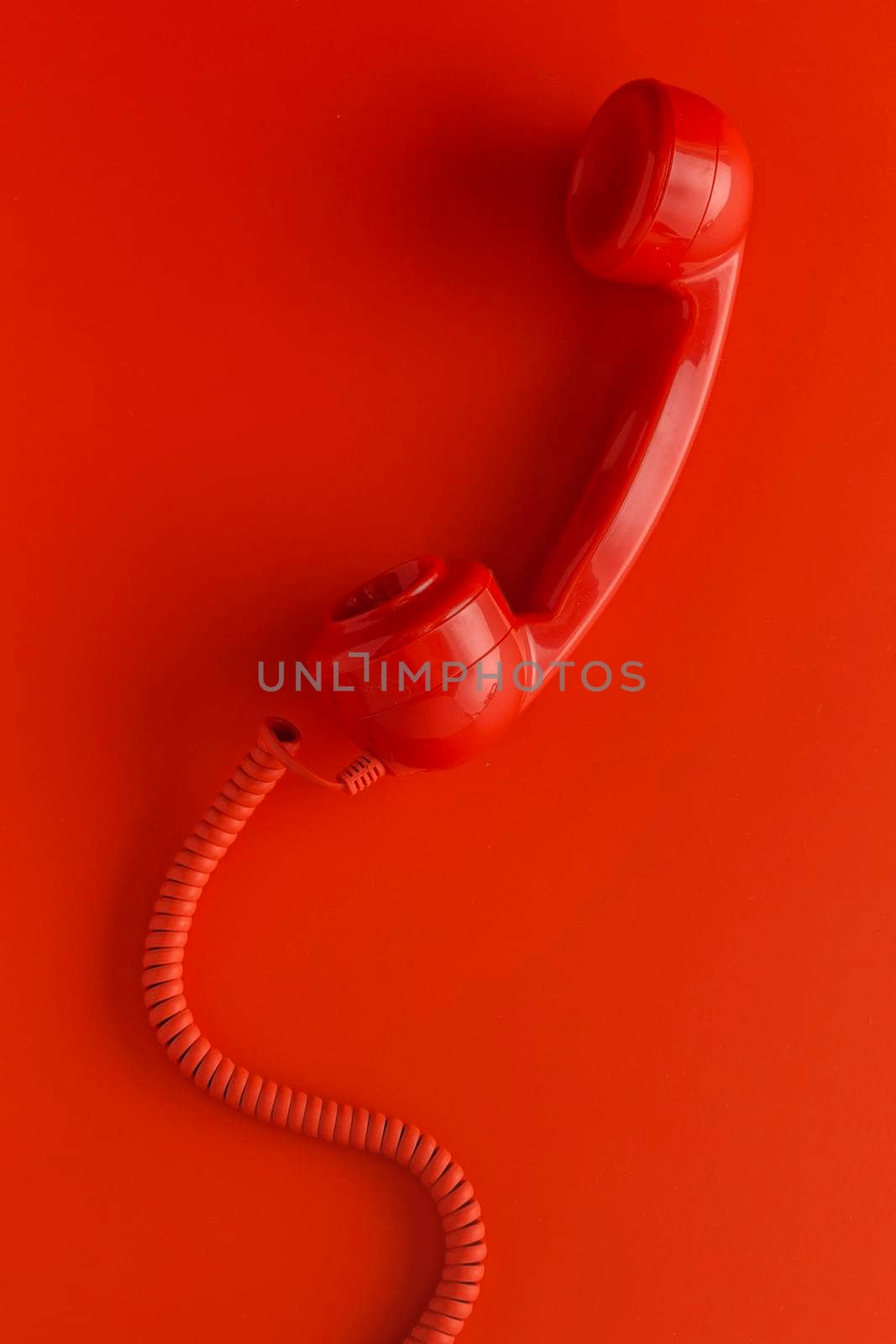 top view telephone receiver with cord. High quality photo by Zahard