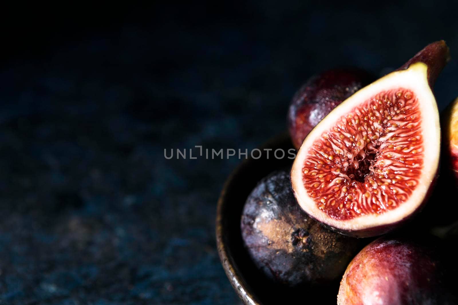 high angle autumn figs plate with copy space. High resolution photo