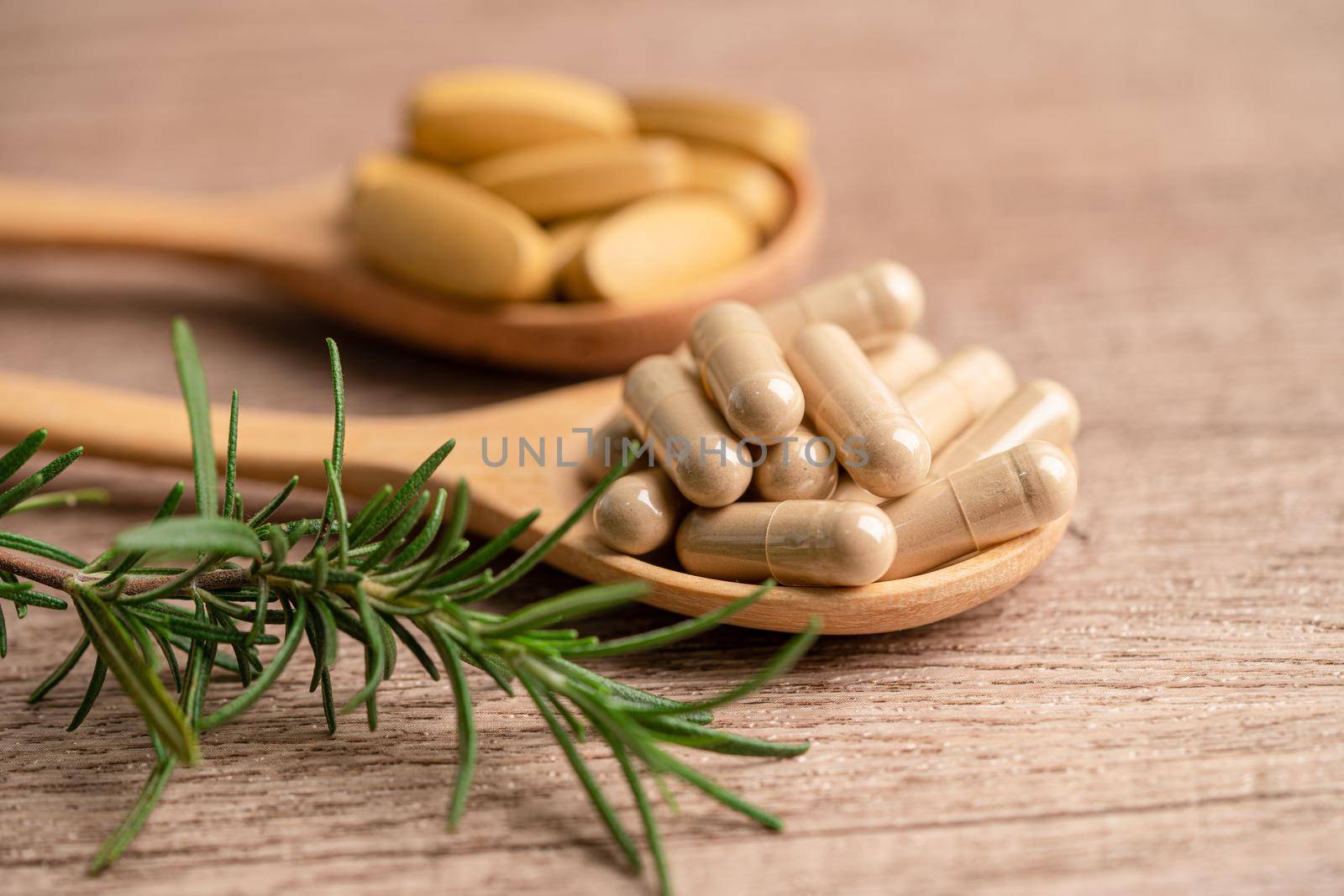 Alternative medicine herbal organic capsule with vitamin E omega 3 fish oil, mineral, drug with herbs leaf natural supplements for healthy good life.