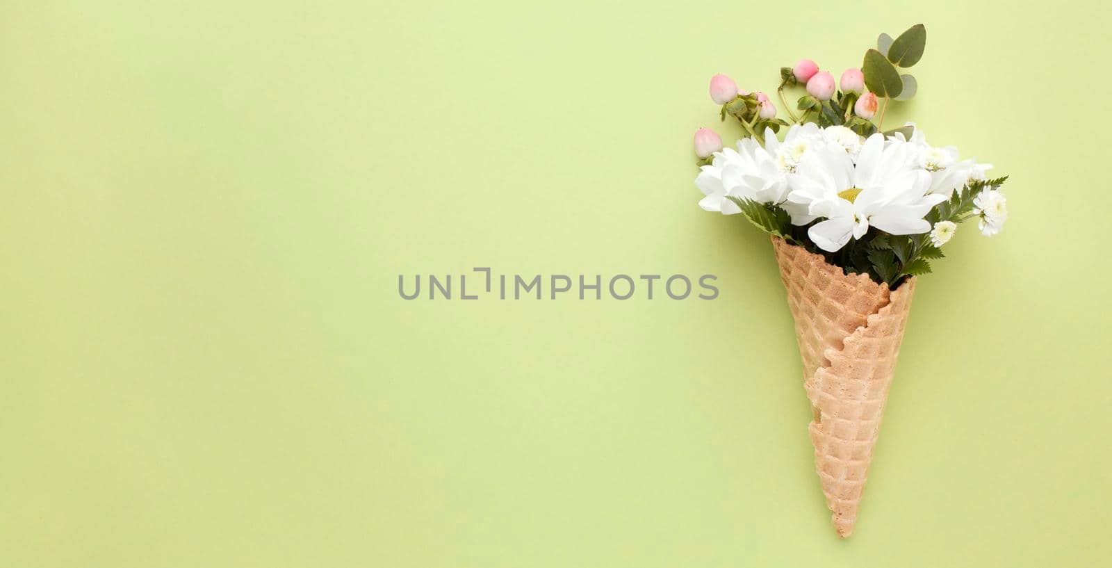 ice cream cone with flowers. High resolution photo
