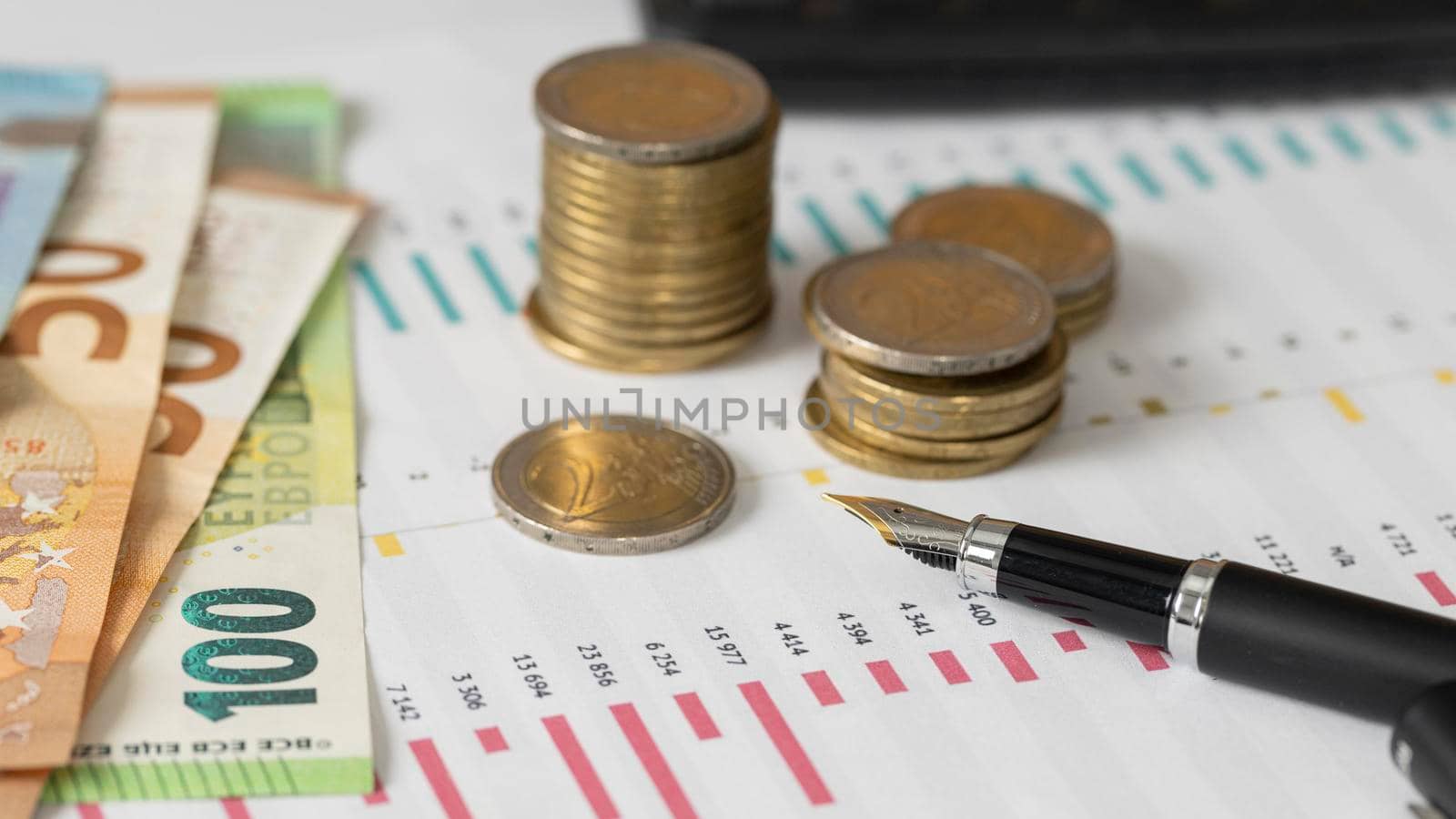 high angle coins banknotes arrangement. High resolution photo