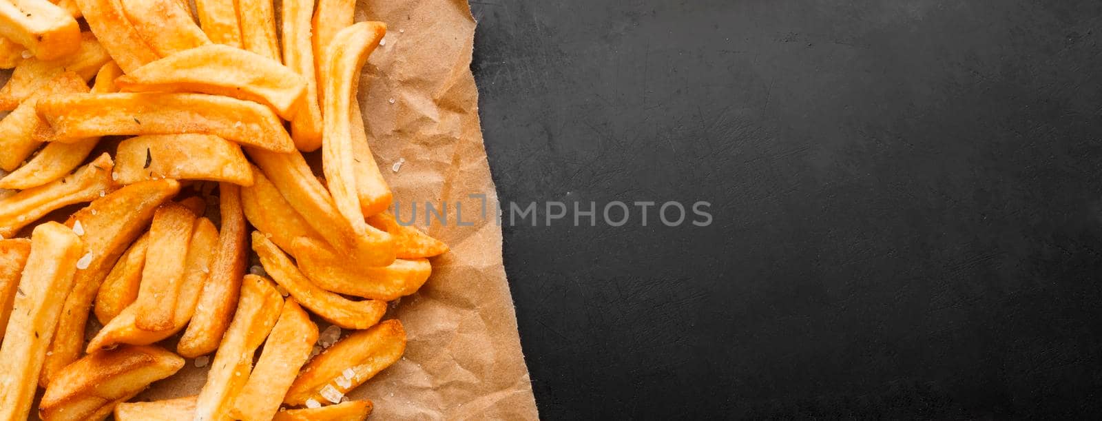 top view french fries paper with . High resolution photo