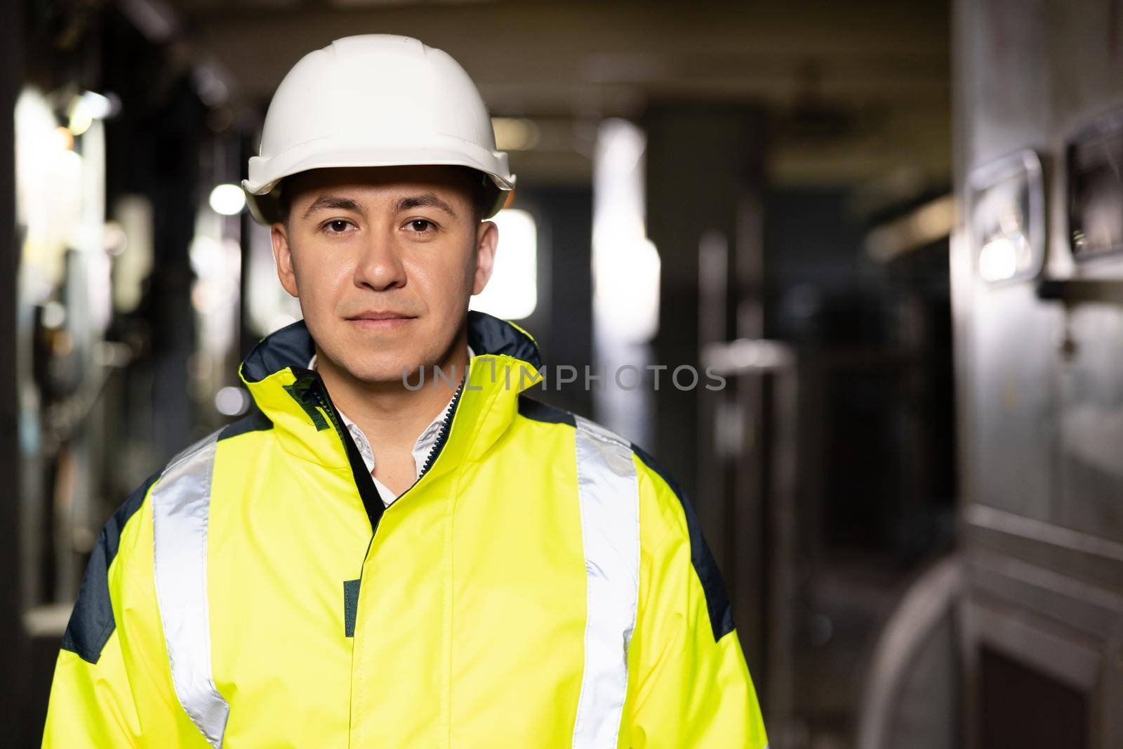Caucasian Business People in Hard Hat or Safety Wear. Confident Contractor or Attractive Mechanic of Machine Inspection for Machinery Tool Job Close-up Indoors. Engineer Plan of Manufacture Work.