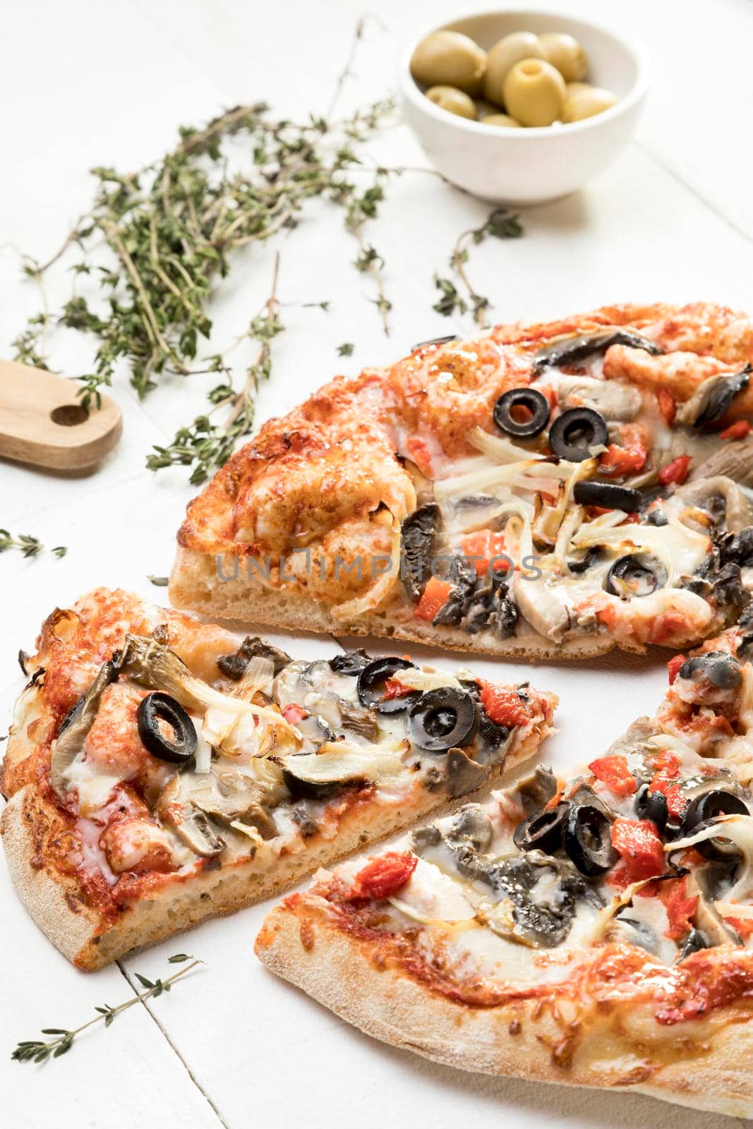 pizza with olives vegetables. High quality photo by Zahard