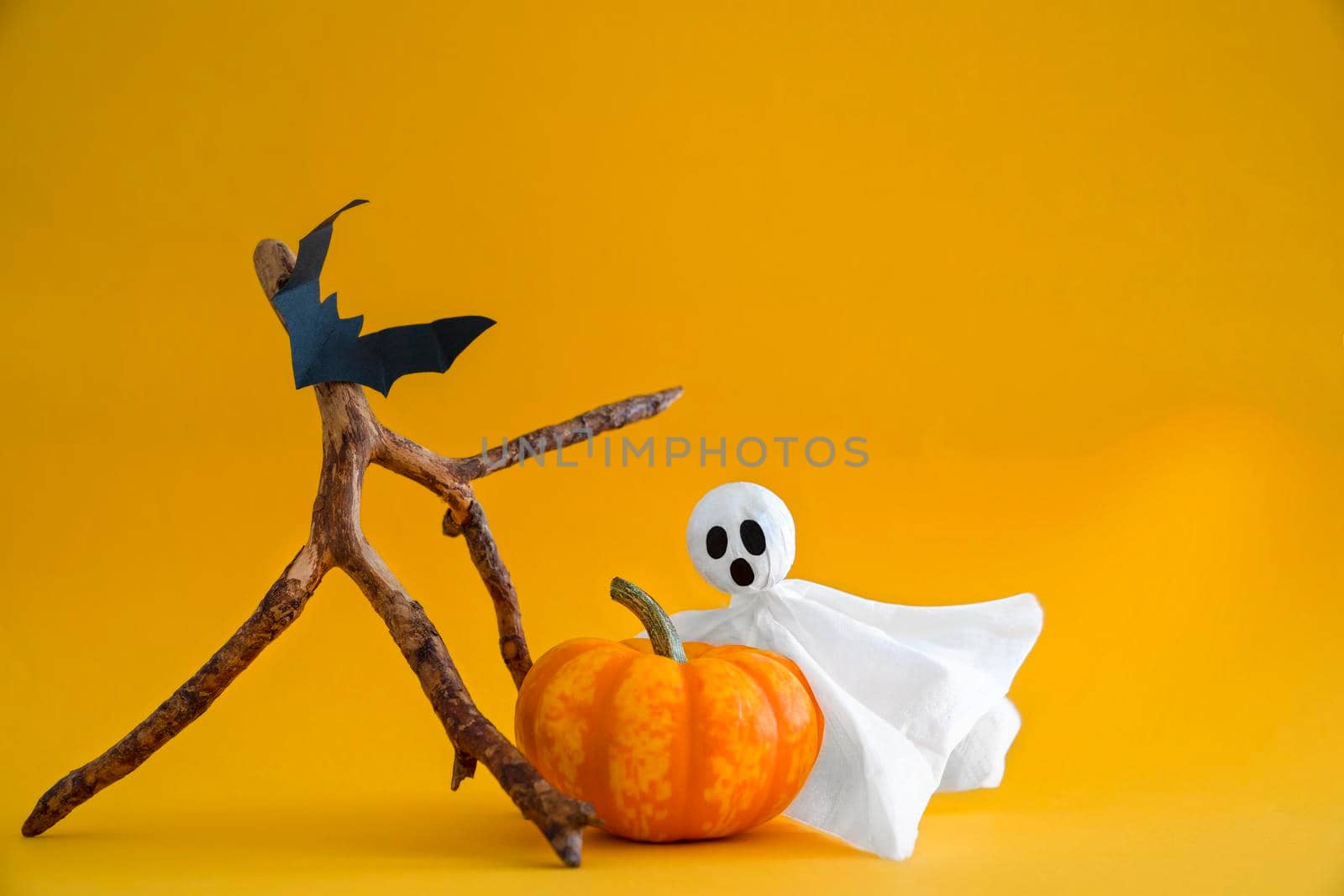 Ghost, pumpkin, bats on orange background with copy space. by Laguna781