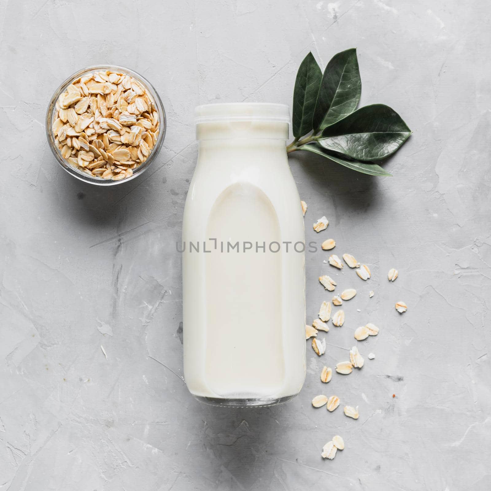 top view milk bottle with oatmeal. High resolution photo