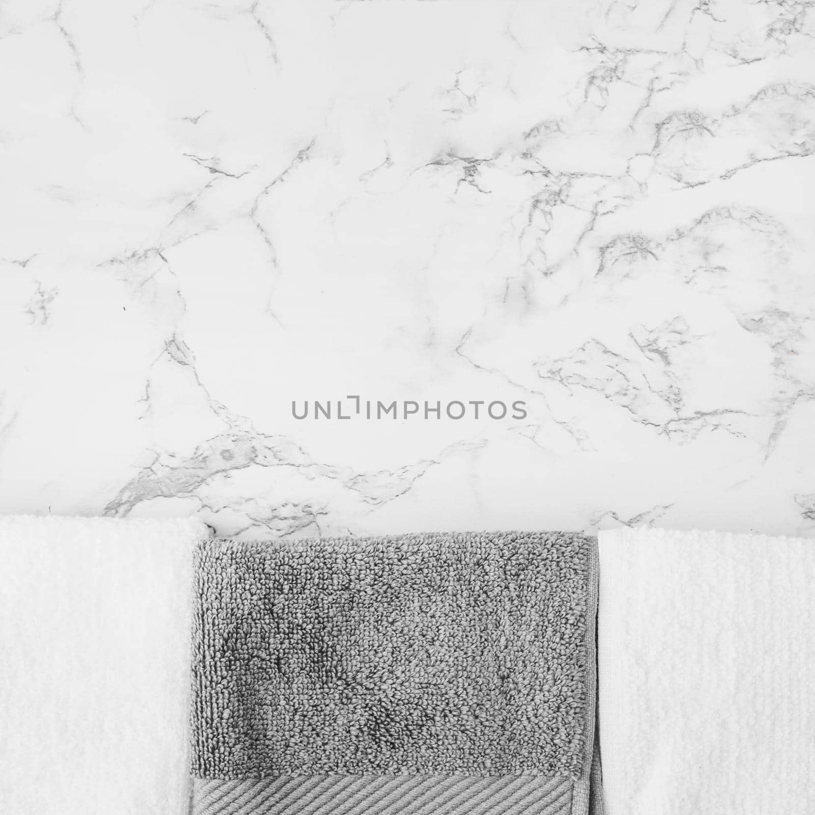 black white towels marble backdrop. High quality photo by Zahard