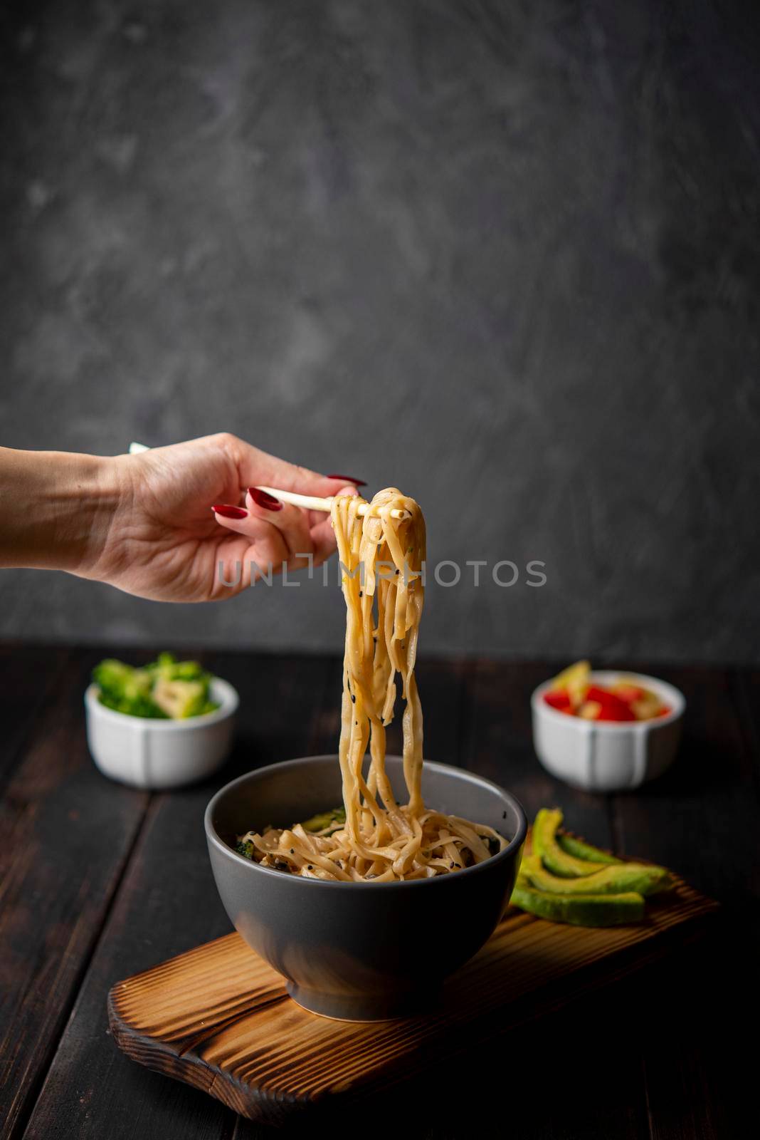 noodles bowl with avocado copy space. High resolution photo