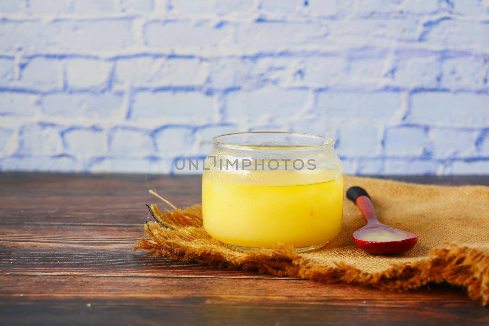 homemade ghee in container on a table
