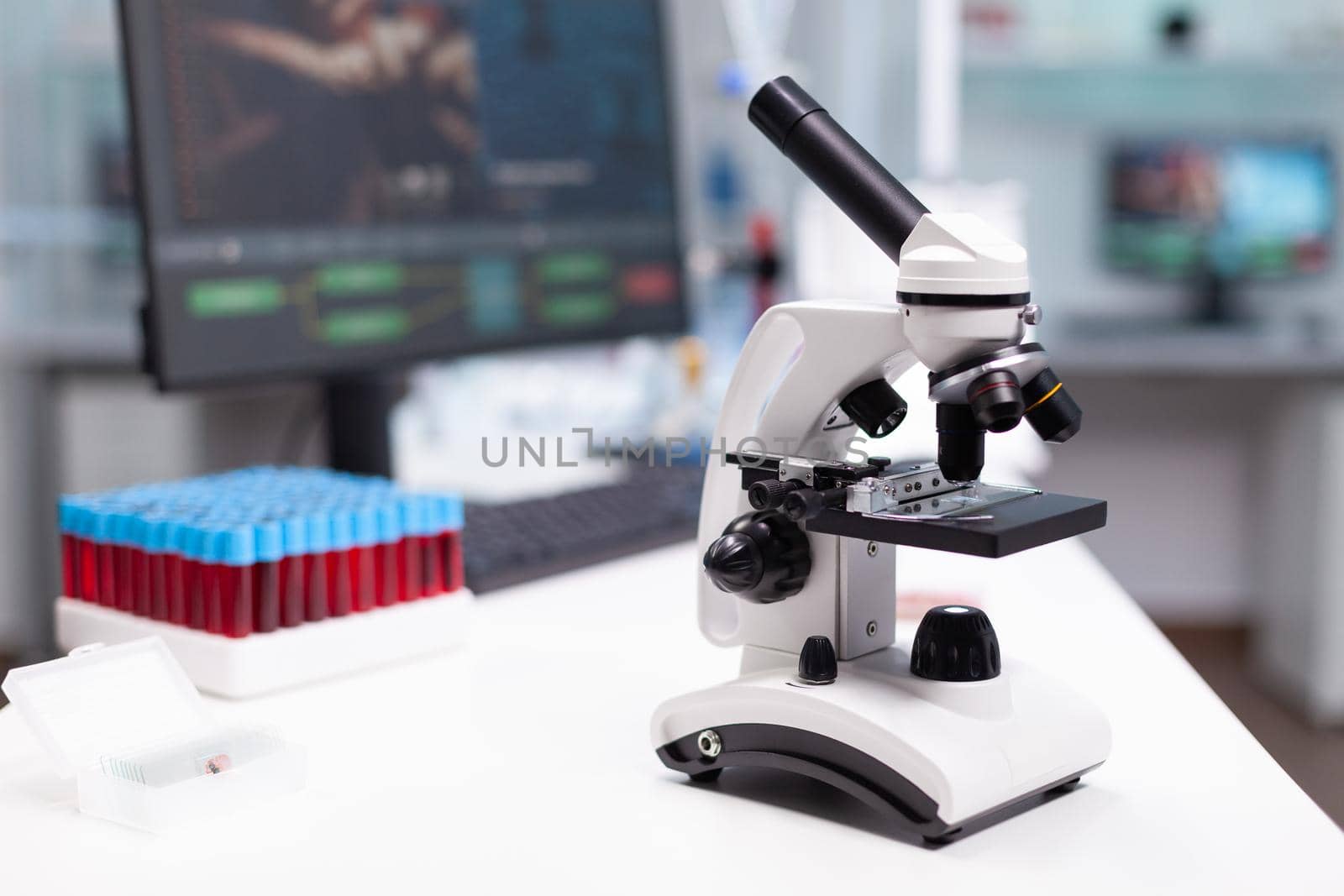 Dna molecular sample under microscope ready for biological virus vaccine investigation in biochemistry pharmaceutical hospital laboratory. Biological expertise research. Healthcare treatment