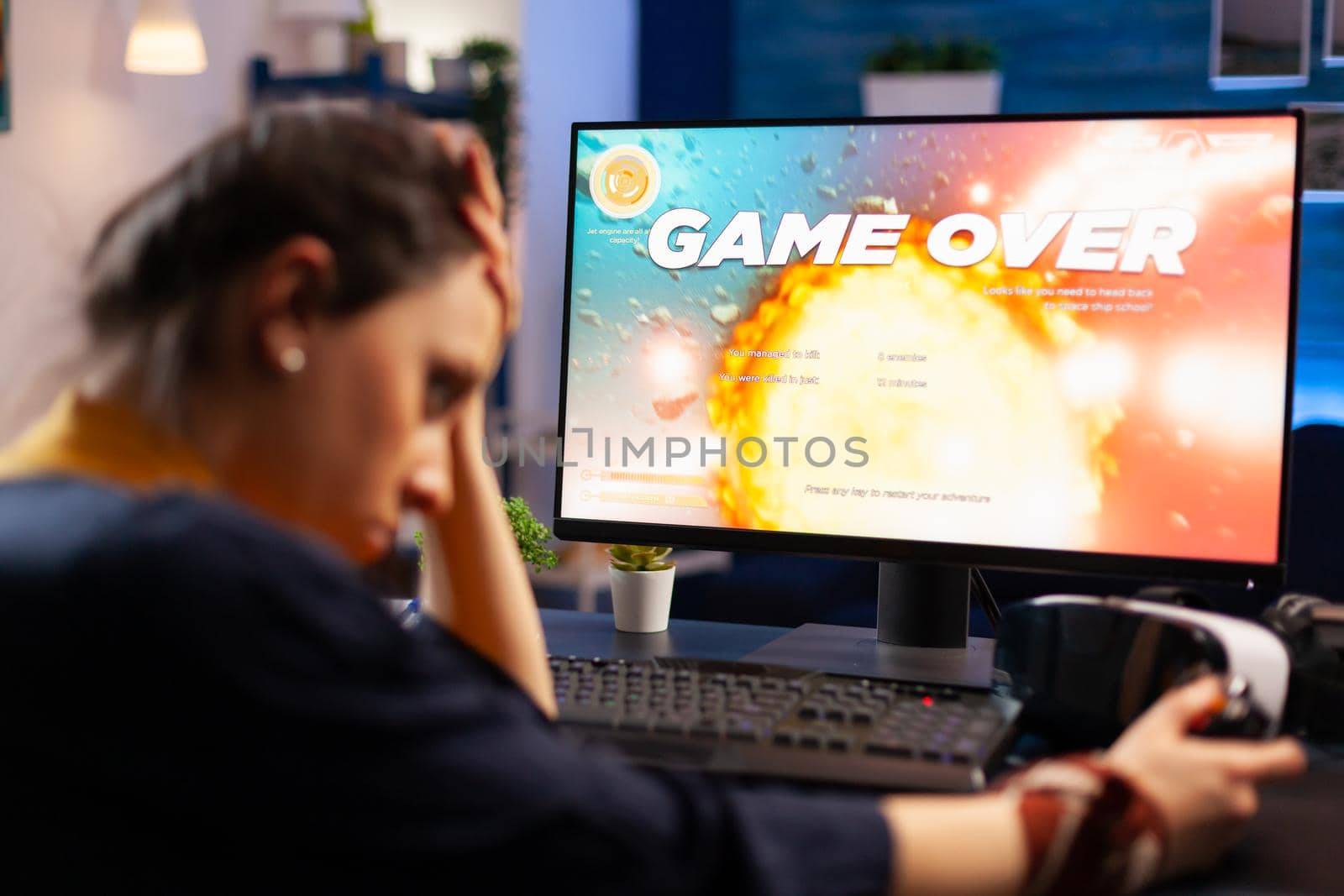 Caucasian gamer losing space shooter videogame competition on professional powerful computer. Professional pro gamer streaming online game with new graphics using modern equipment