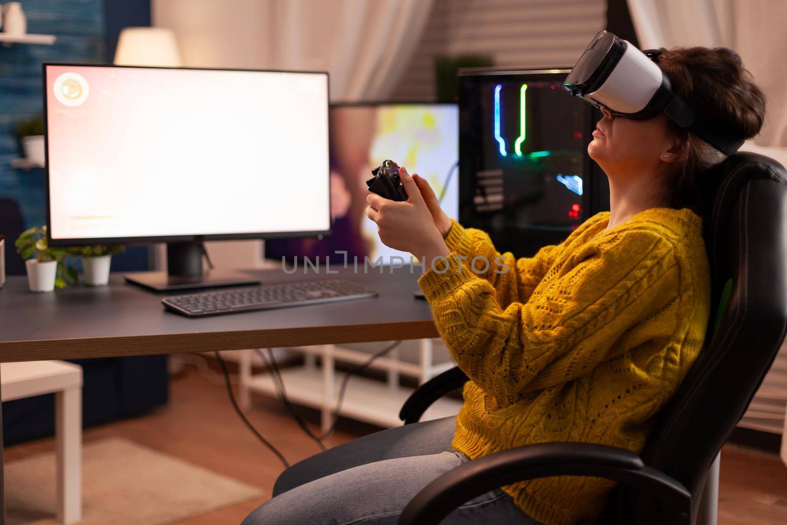 Woman esport cyber playing online game with virtual reality headset and wireless controller. Virtual shooter game championship in cyberspace, esports player performing on pc during gaming tournament.
