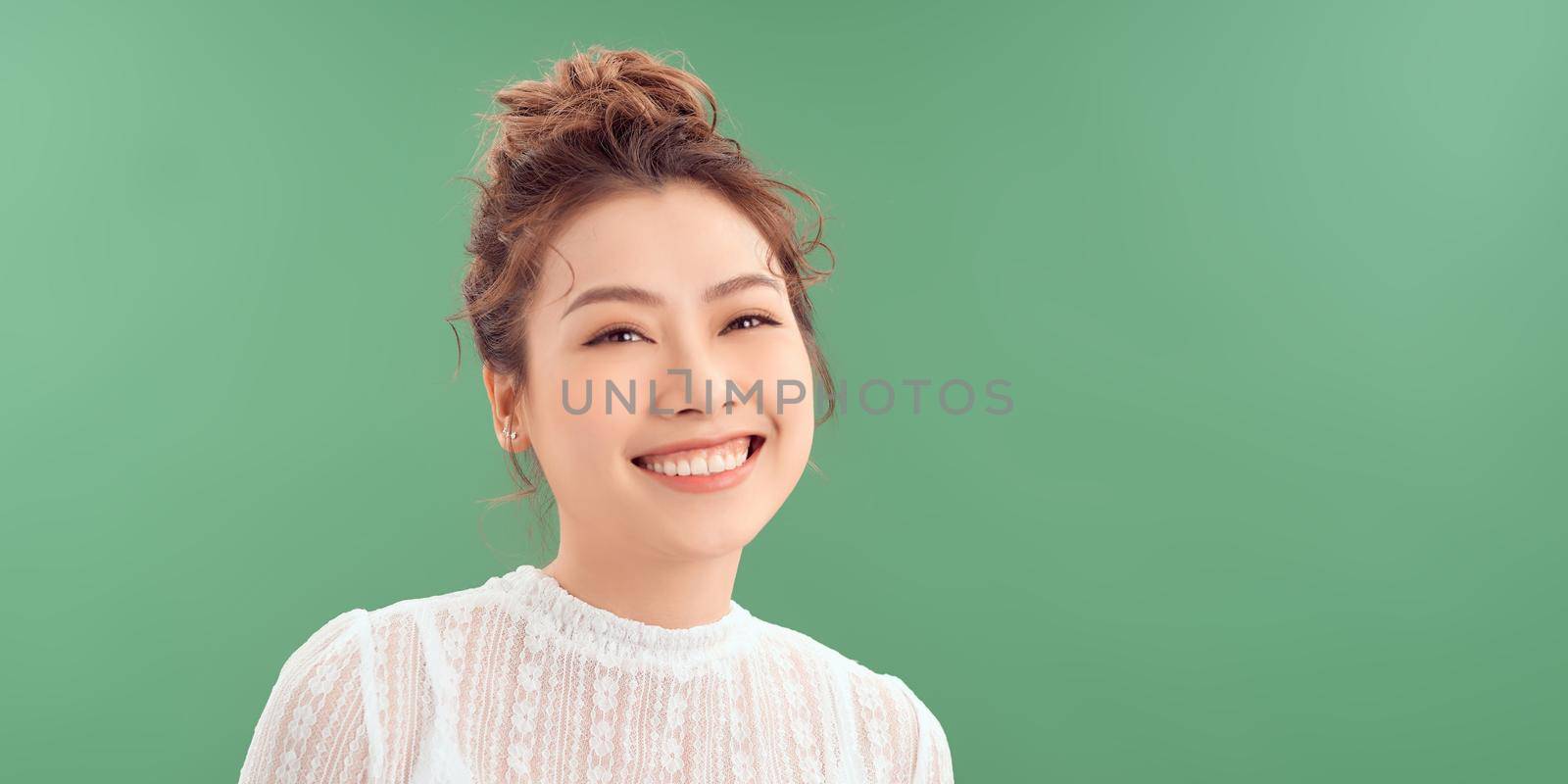 lifestyle and people concept:Young happy woman with curly hair by makidotvn