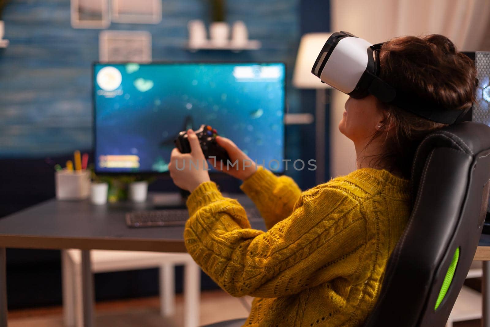 Pro cyber sport gamer relaxing playing video games using vr headset late night. Virtual shooter game championship in cyberspace, esports player performing on pc during gaming tournament.