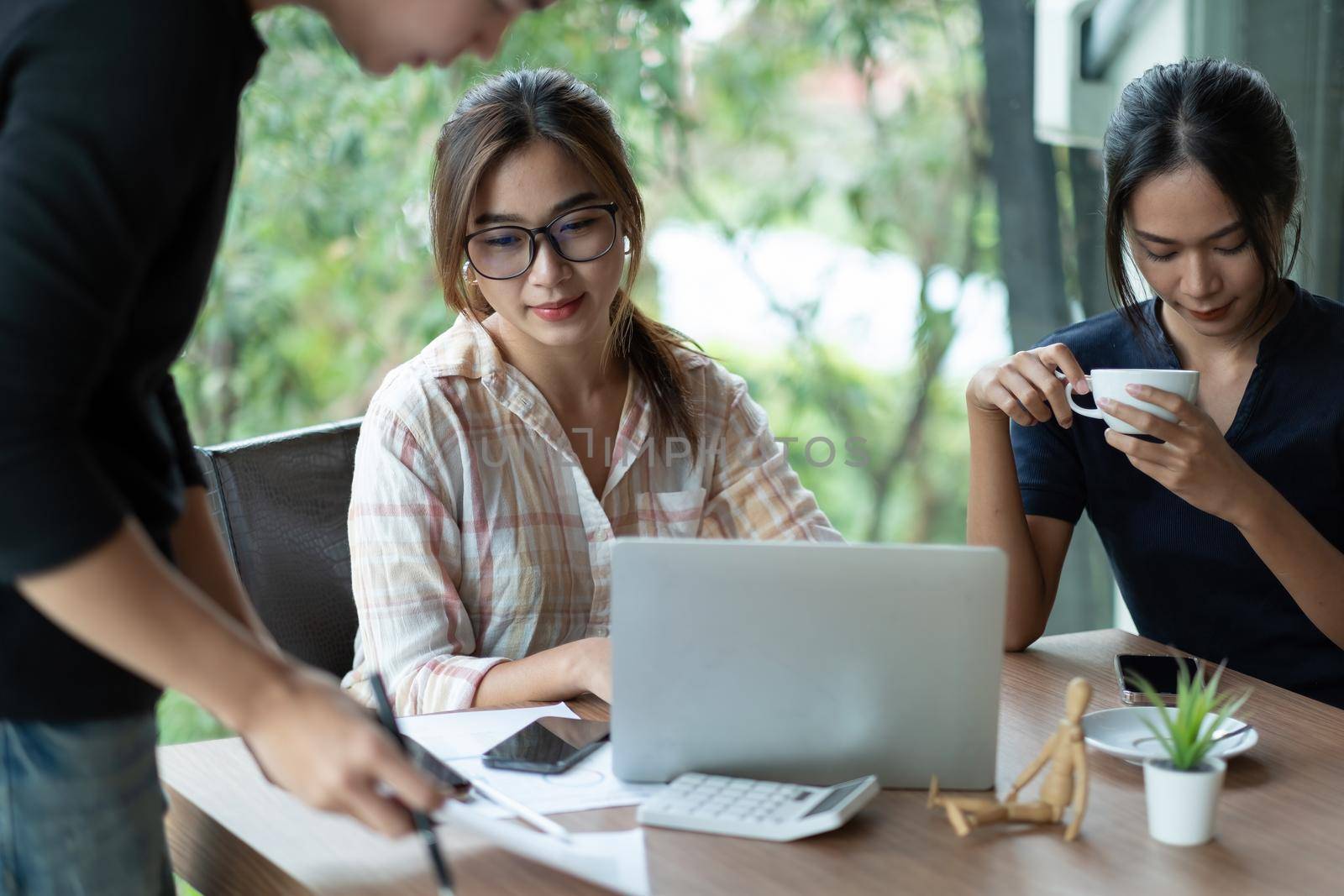 Business Asian people team discussing working analyzing with financial data and marketing growth report graph in team, presentation and brainstorming to strategy planning making profit of company