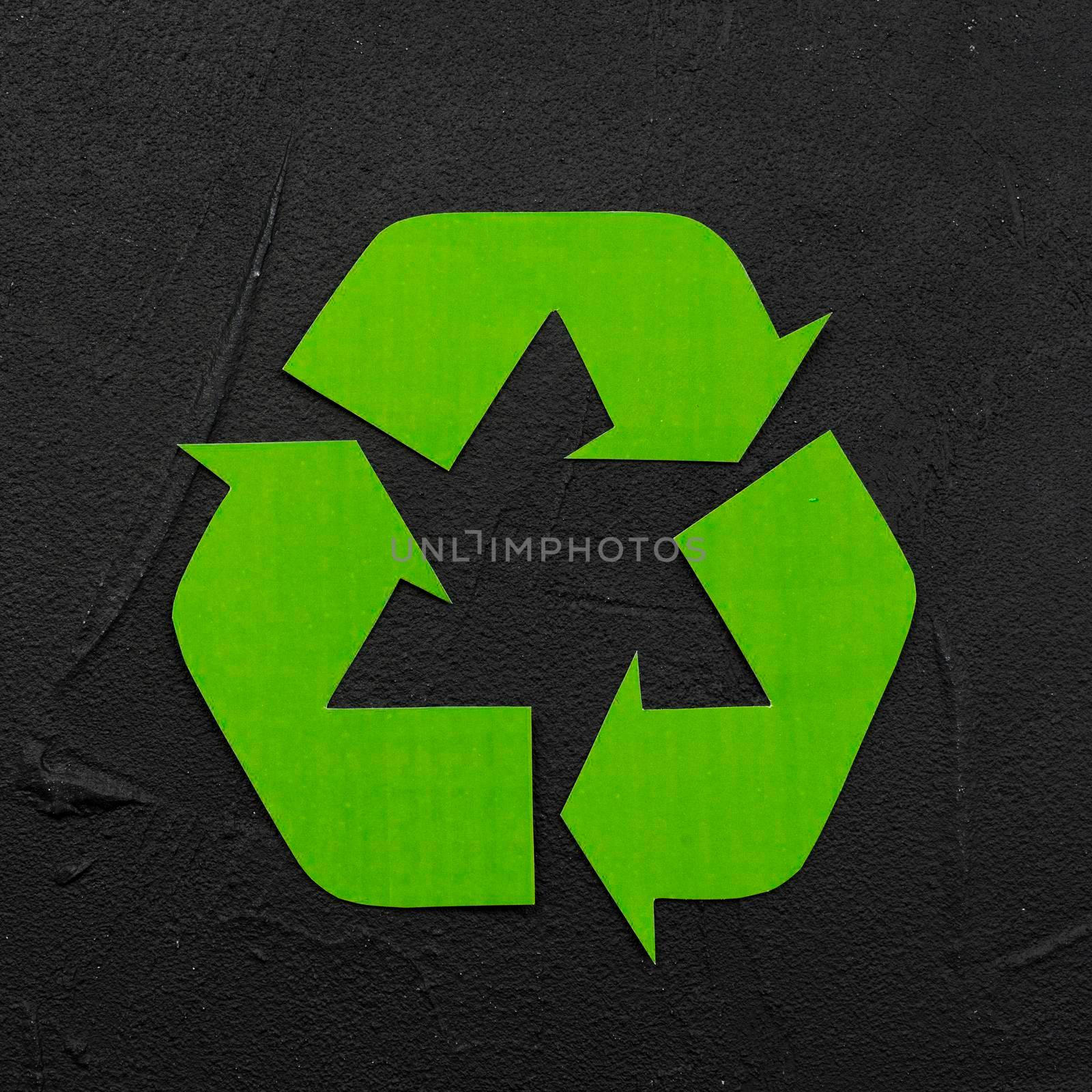 recycle logo black plaster background. High resolution photo