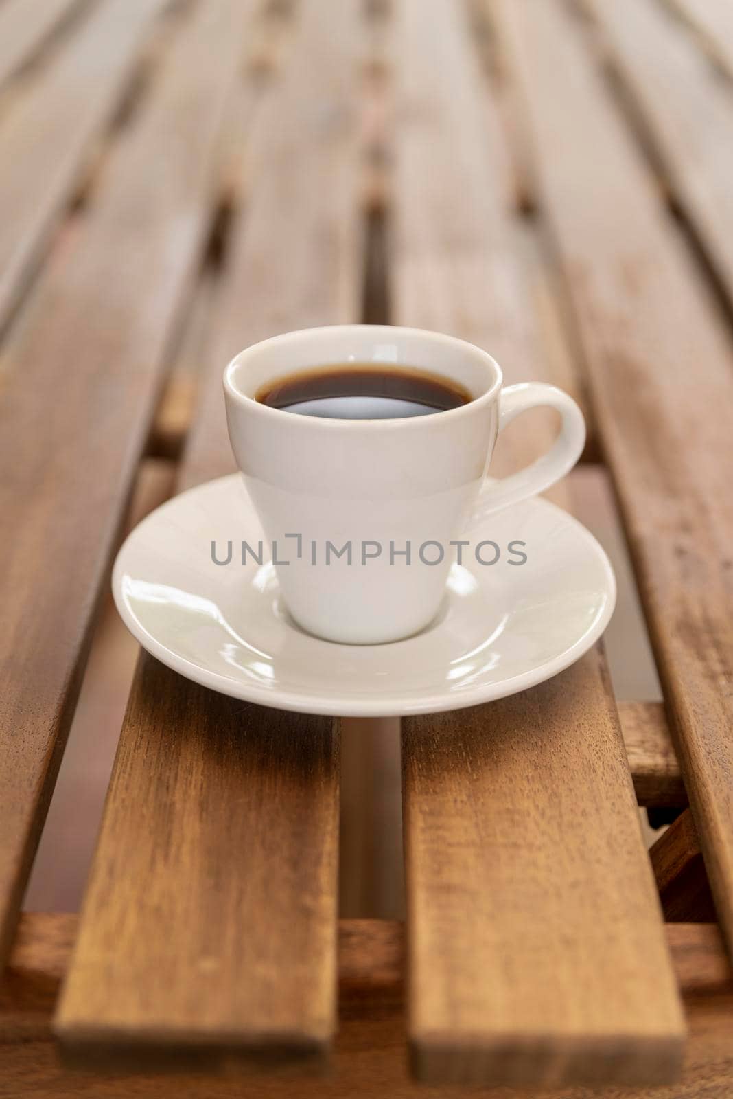 minimalistic coffee cup wooden table. High quality photo by Zahard