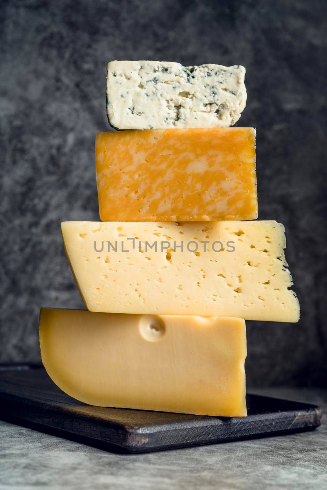 delicious pile cheese top each other. High quality photo by Zahard