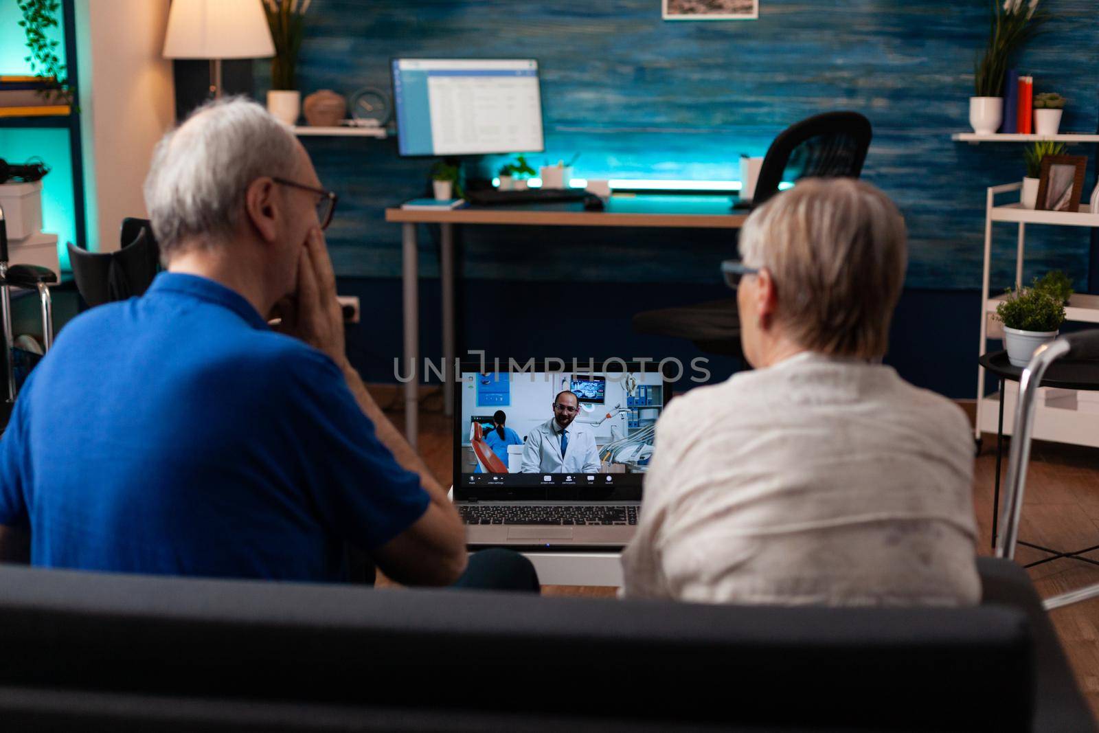 Retirement patients on video call dentist appointment online conference for healing pain prescription medicine. Old senior married people using telemedicine to cure healthcare problems