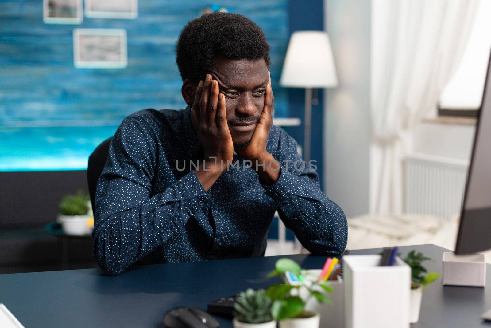 African american man having big headache from stress by DCStudio