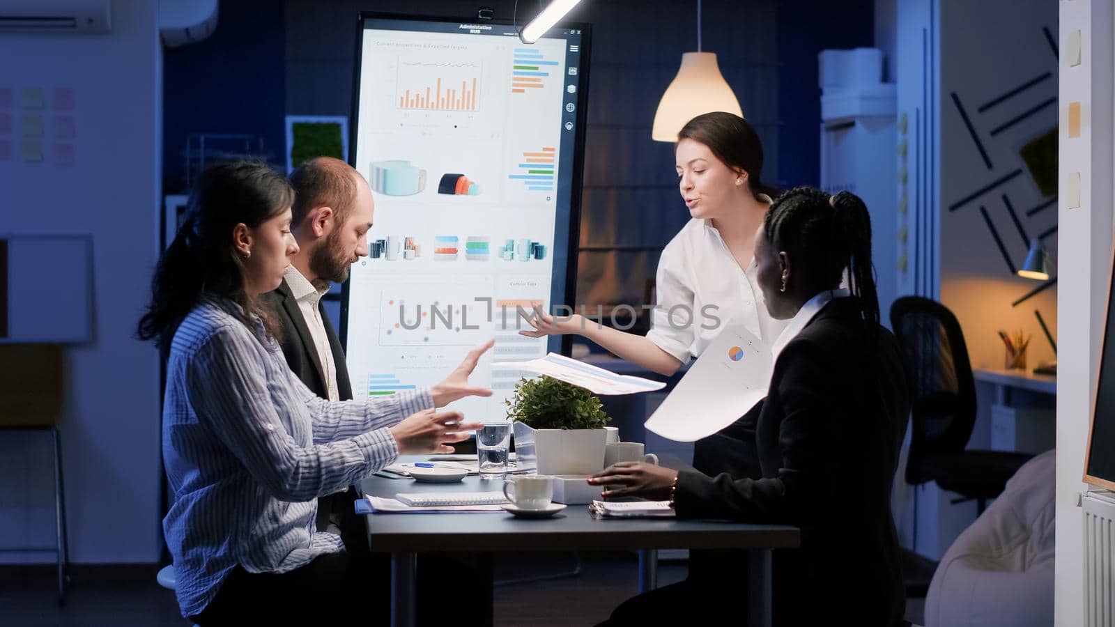 Upset disappointed businesswoman entering in office meeting room late at night by DCStudio