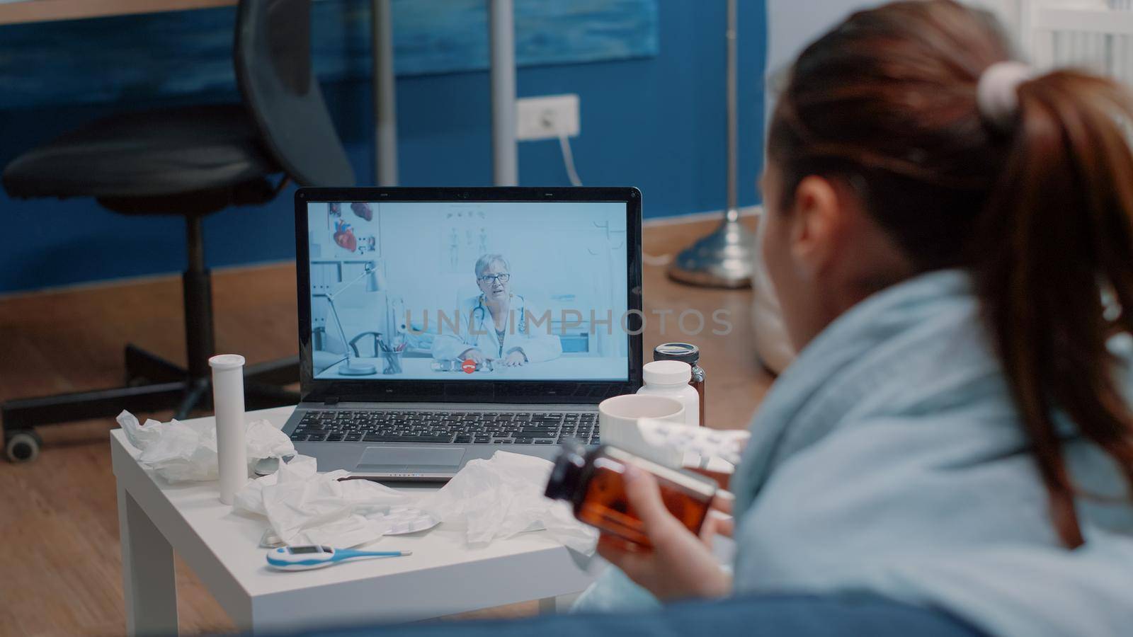 Patient with flu using video call communication by DCStudio