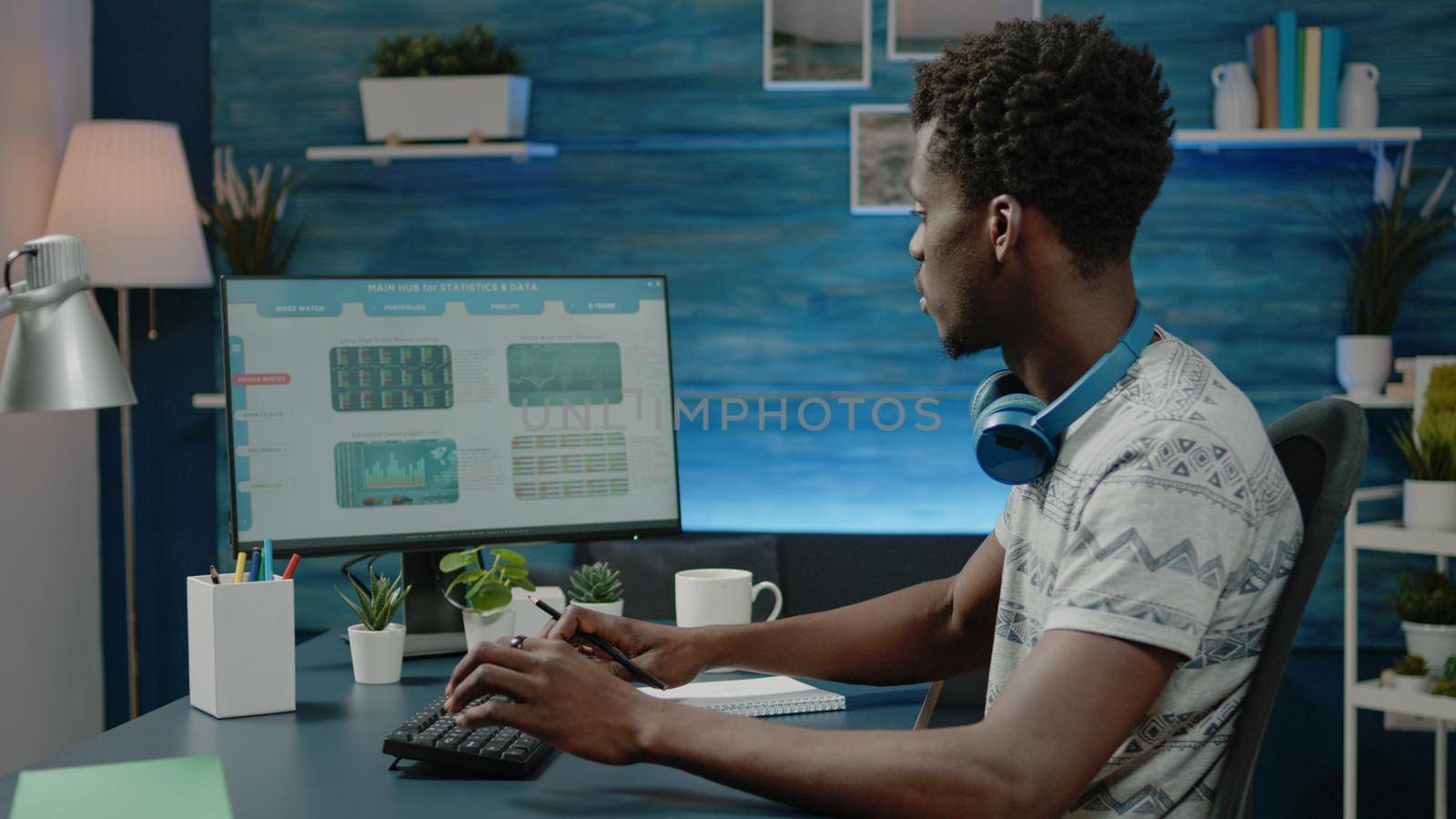 Stock market broker working with charts of global currency data on computer. Man looking at financial exchange and investment for trade value. Person analyzing internet banking.