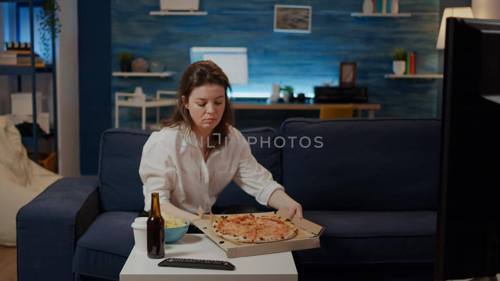 Young adult receiving order of takeaway food by DCStudio