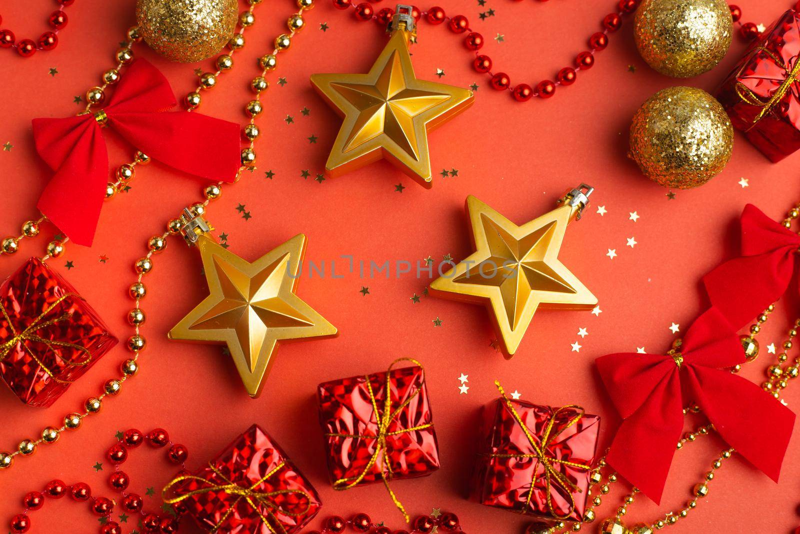 New Year 's layout on a red background with balloons . New Year and Christmas copy space. . Festive decoration. Christmas balls