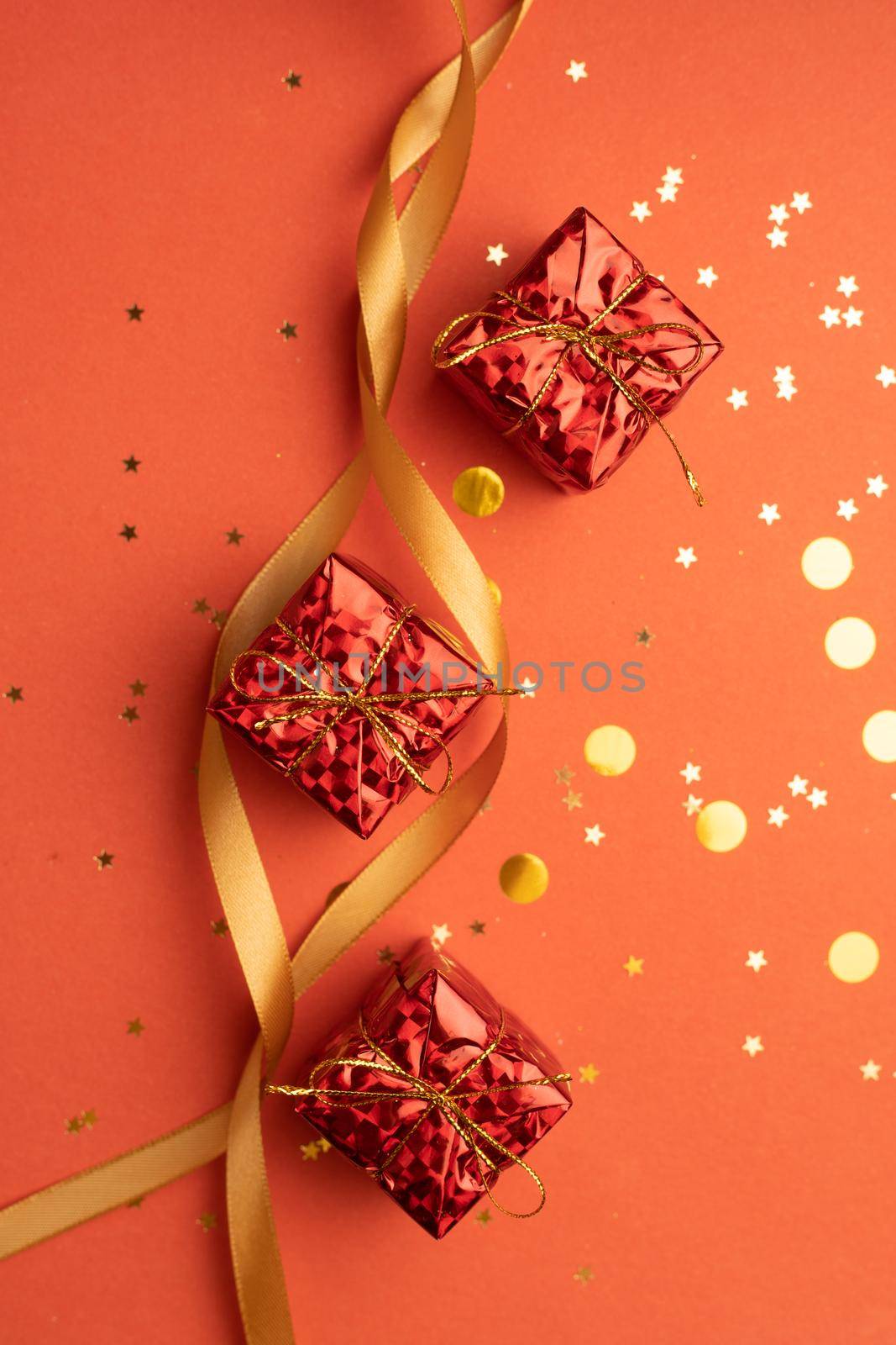 New Year 's layout on a red background with balloons . New Year and Christmas copy space. . Festive decoration. Christmas balls