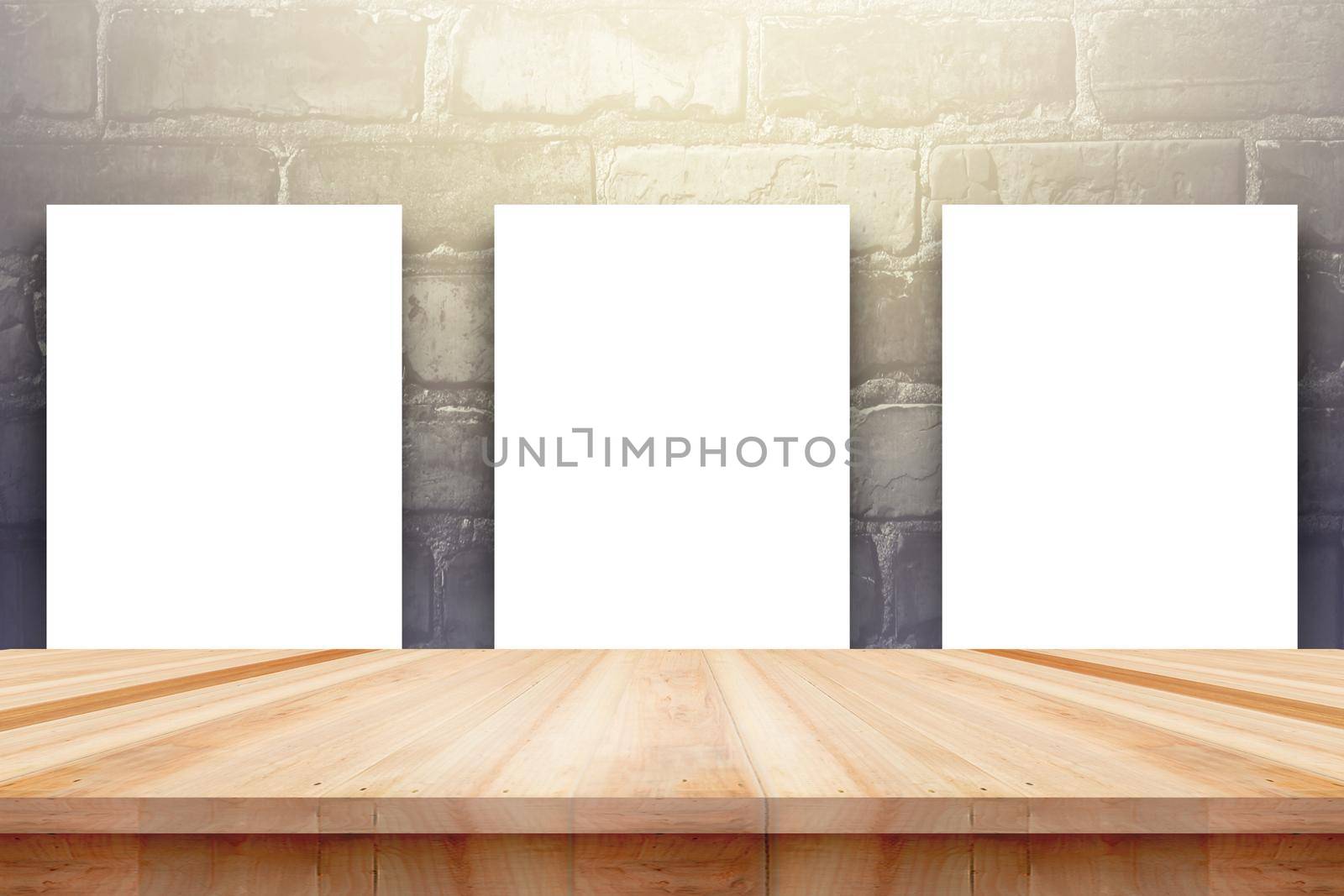 Poster or frame mock up template with office items and painting brushes on wooden table by Benzoix
