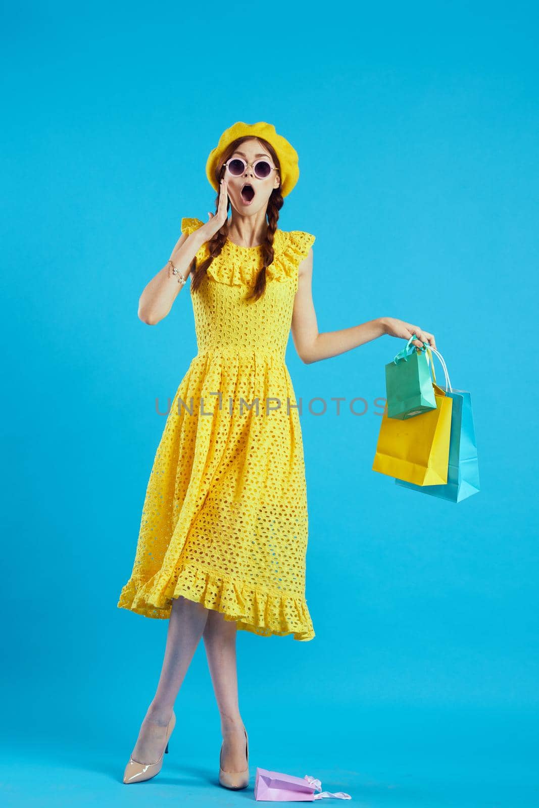 smiling woman wearing sunglasses posing shopping fashion isolated background. High quality photo