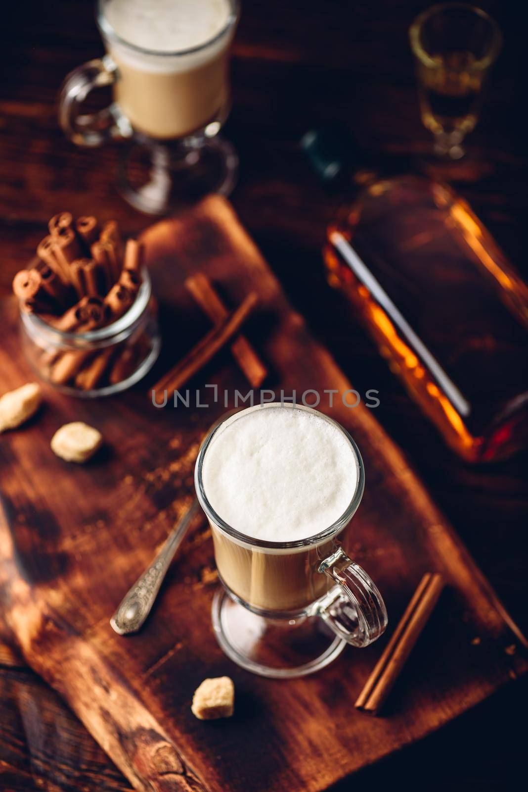 Irish coffee in drinking glass by Seva_blsv