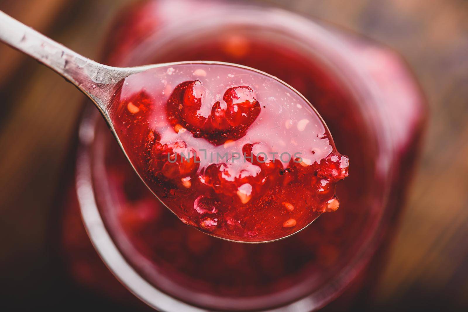 Spoonful of homemade raspberry jam by Seva_blsv