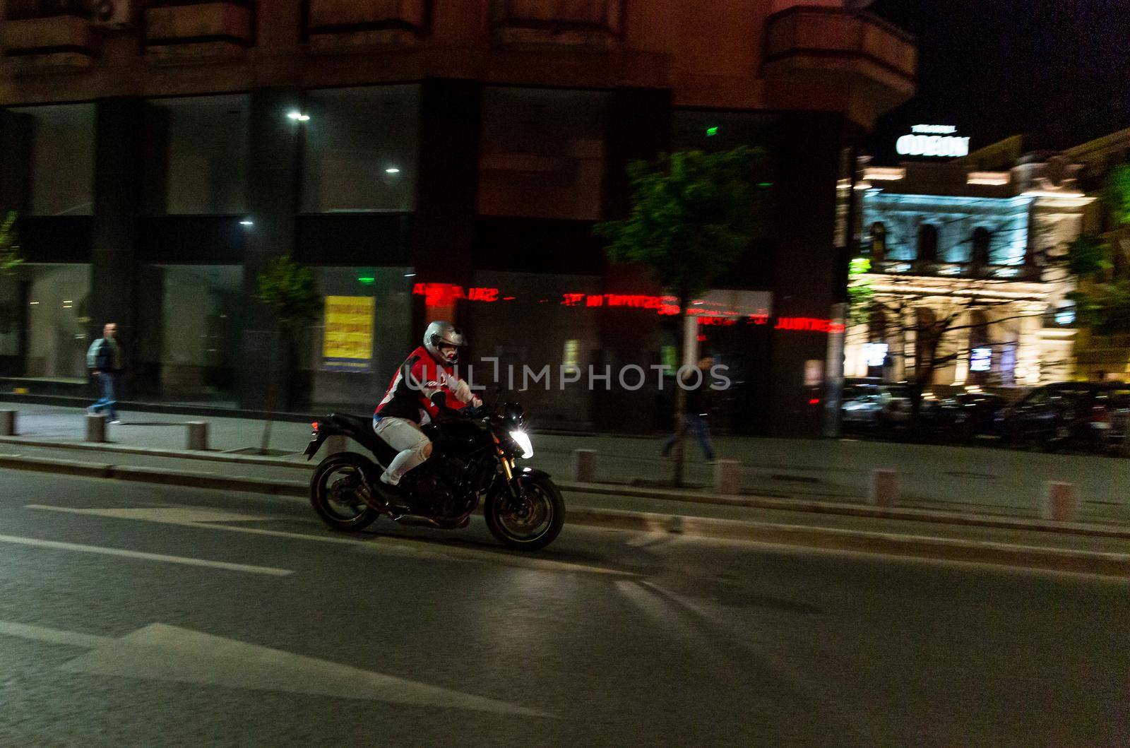 Young man on a motorcycle in Bucharest, Romania, 2021